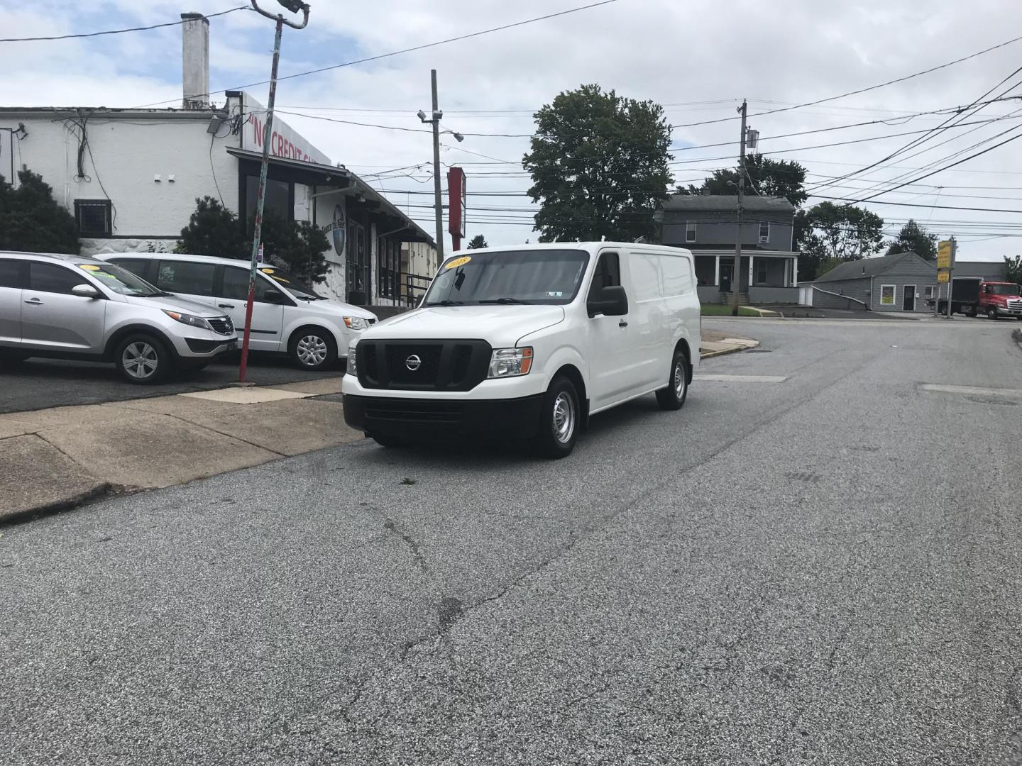 2018 White /Gray Nissan NV Cargo 1500 S (1N6BF0KM4JN) with an 4.0L V6 engine, 5A transmission, located at 577 Chester Pike, Prospect Park, PA, 19076, (610) 237-1015, 39.886154, -75.302338 - Photo#2