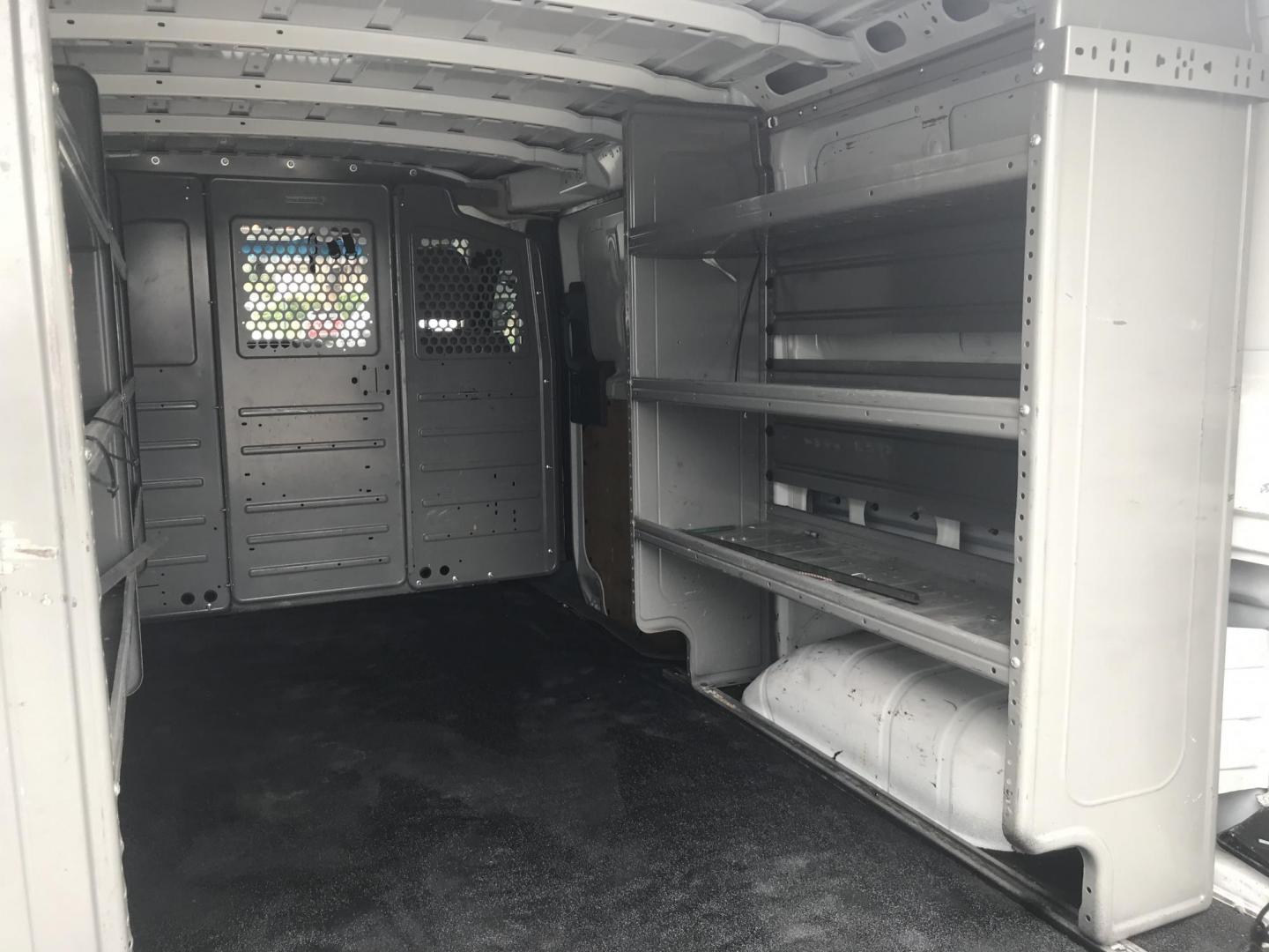 2018 White /Gray Nissan NV Cargo 1500 S (1N6BF0KM4JN) with an 4.0L V6 engine, 5A transmission, located at 577 Chester Pike, Prospect Park, PA, 19076, (610) 237-1015, 39.886154, -75.302338 - Photo#20