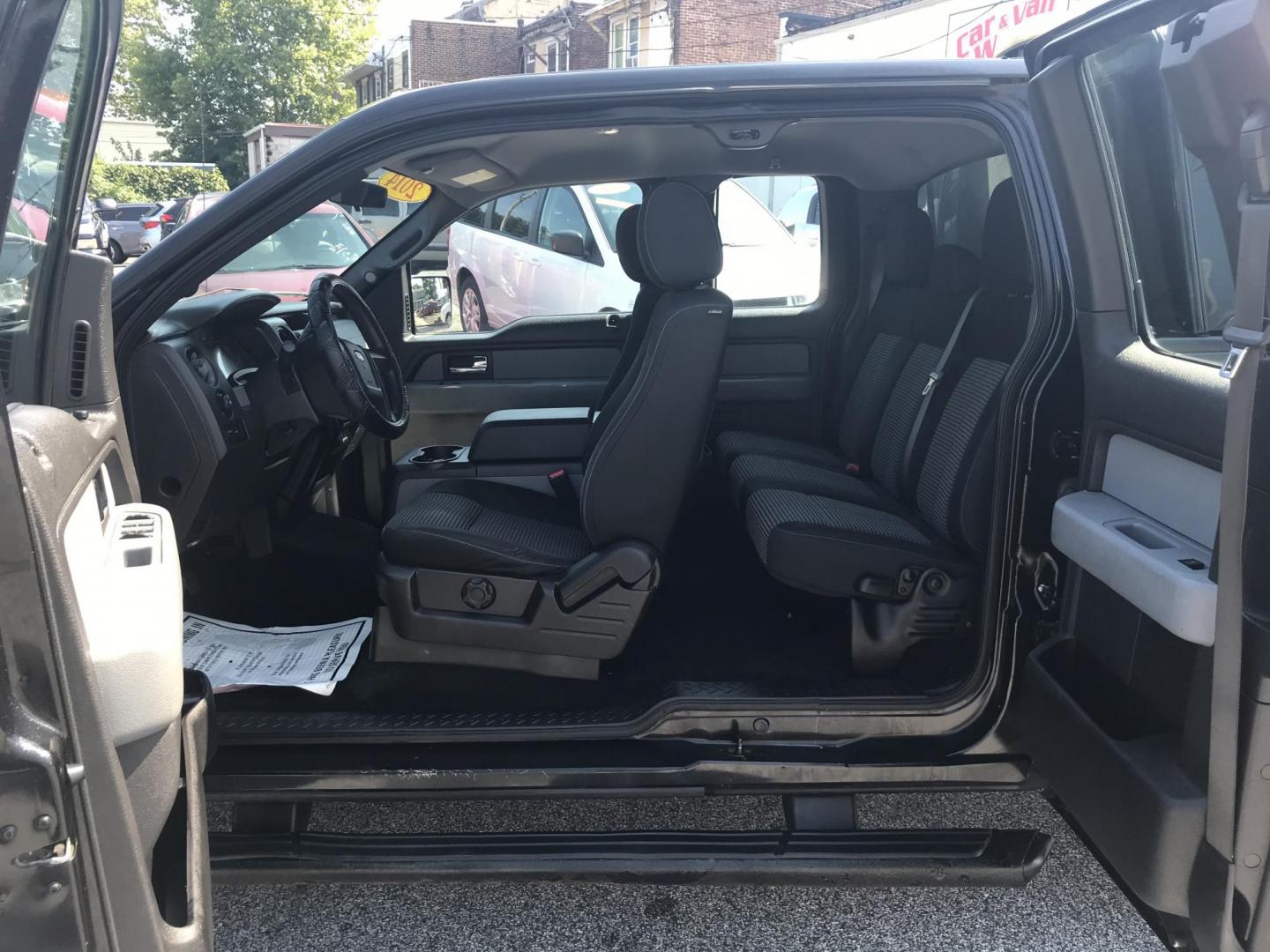 2014 /Black Ford F-150 STX SuperCab 6.5-ft. Bed 4WD (1FTEX1EM8EK) with an 3.7L V6 DOHC 24V engine, 6-Speed Automatic transmission, located at 577 Chester Pike, Prospect Park, PA, 19076, (610) 237-1015, 39.886154, -75.302338 - 2014 Ford F150 STX: Extended cab (3-door), 4x4, bed cap with side access, trailer hitch, new PA inspection, runs LIKE NEW! This vehicle comes inspected and has been given a bumper to bumper safety check. It is very clean, reliable, and well maintained. We offer a unique pay plan that is known for - Photo#16