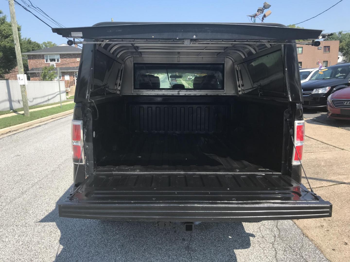 2014 /Black Ford F-150 STX SuperCab 6.5-ft. Bed 4WD (1FTEX1EM8EK) with an 3.7L V6 DOHC 24V engine, 6-Speed Automatic transmission, located at 577 Chester Pike, Prospect Park, PA, 19076, (610) 237-1015, 39.886154, -75.302338 - 2014 Ford F150 STX: Extended cab (3-door), 4x4, bed cap with side access, trailer hitch, new PA inspection, runs LIKE NEW! This vehicle comes inspected and has been given a bumper to bumper safety check. It is very clean, reliable, and well maintained. We offer a unique pay plan that is known for - Photo#18