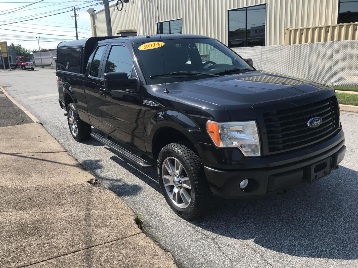 2014 /Black Ford F-150 STX SuperCab 6.5-ft. Bed 4WD (1FTEX1EM8EK) with an 3.7L V6 DOHC 24V engine, 6-Speed Automatic transmission, located at 577 Chester Pike, Prospect Park, PA, 19076, (610) 237-1015, 39.886154, -75.302338 - 2014 Ford F150 STX: Extended cab (3-door), 4x4, bed cap with side access, trailer hitch, new PA inspection, runs LIKE NEW! This vehicle comes inspected and has been given a bumper to bumper safety check. It is very clean, reliable, and well maintained. We offer a unique pay plan that is known for - Photo#3