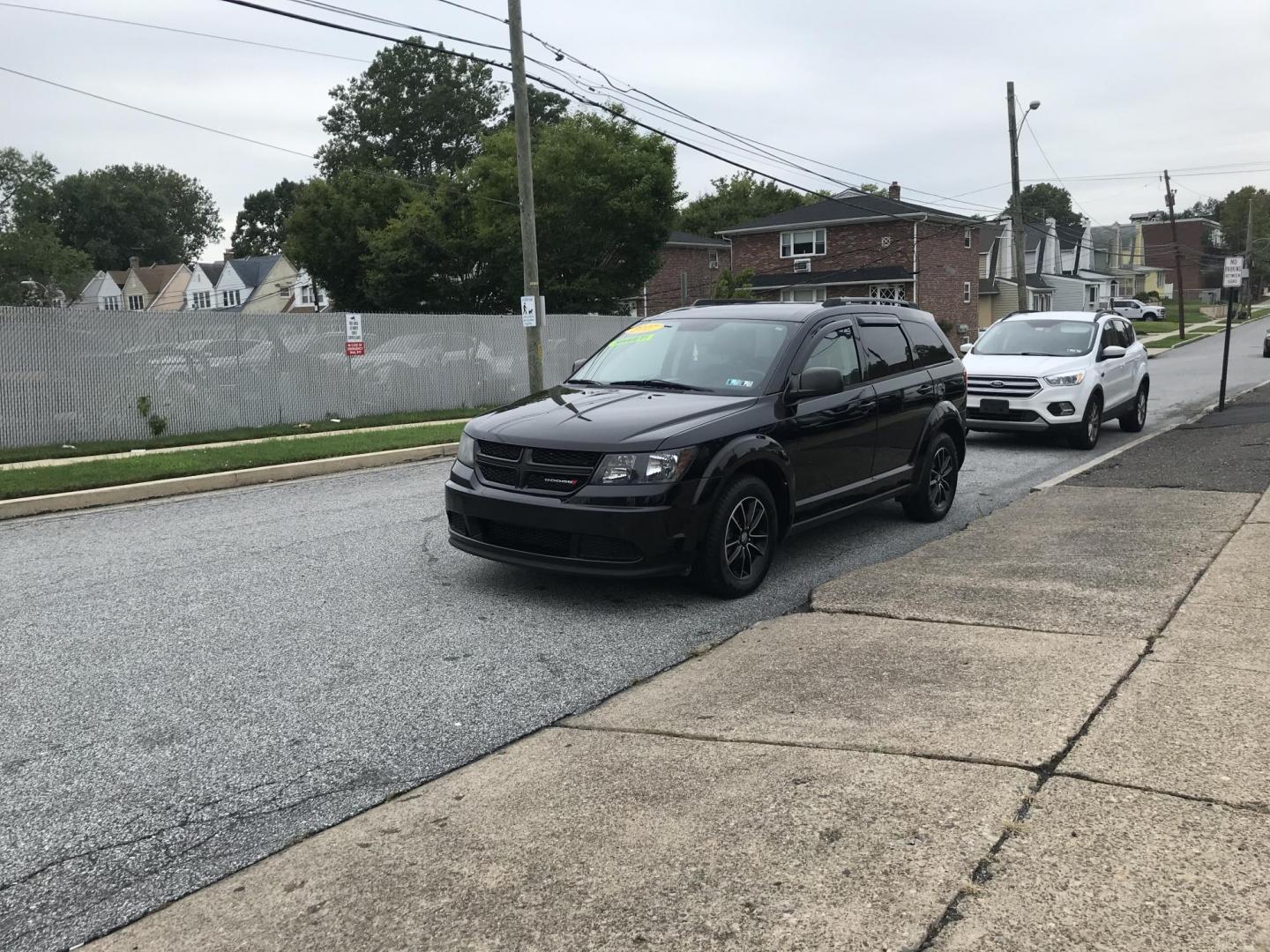 2017 Black /Black Dodge Journey SE (3C4PDCAB1HT) with an 2.4L L4 DOHC 16V engine, 4A transmission, located at 577 Chester Pike, Prospect Park, PA, 19076, (610) 237-1015, 39.886154, -75.302338 - Photo#1