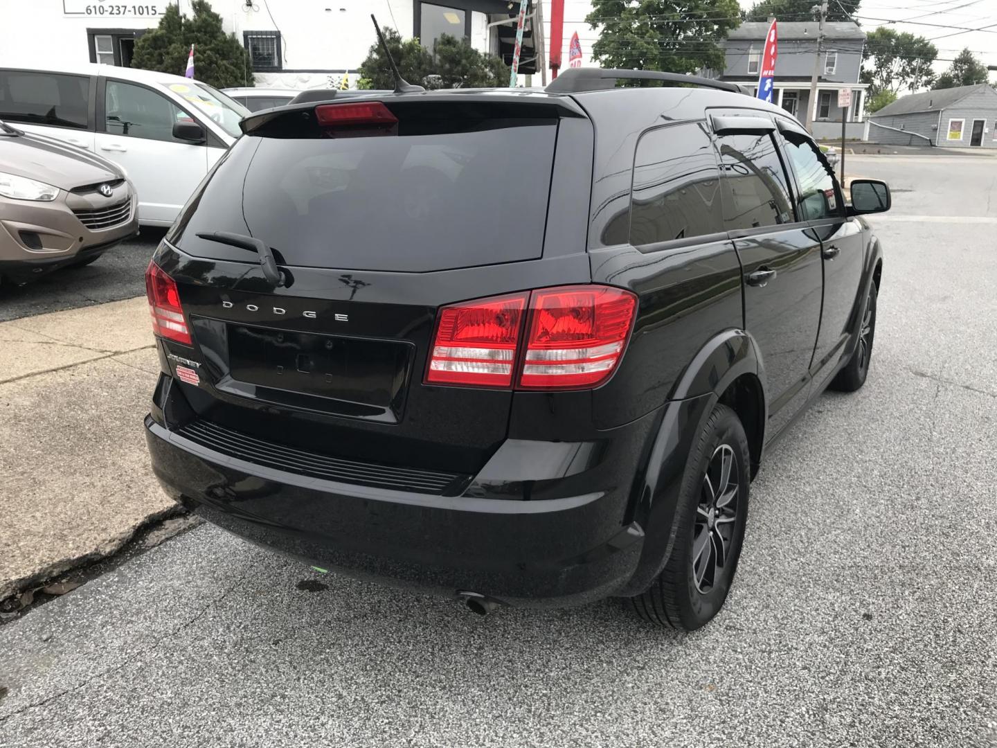 2017 Black /Black Dodge Journey SE (3C4PDCAB1HT) with an 2.4L L4 DOHC 16V engine, 4A transmission, located at 577 Chester Pike, Prospect Park, PA, 19076, (610) 237-1015, 39.886154, -75.302338 - Photo#5