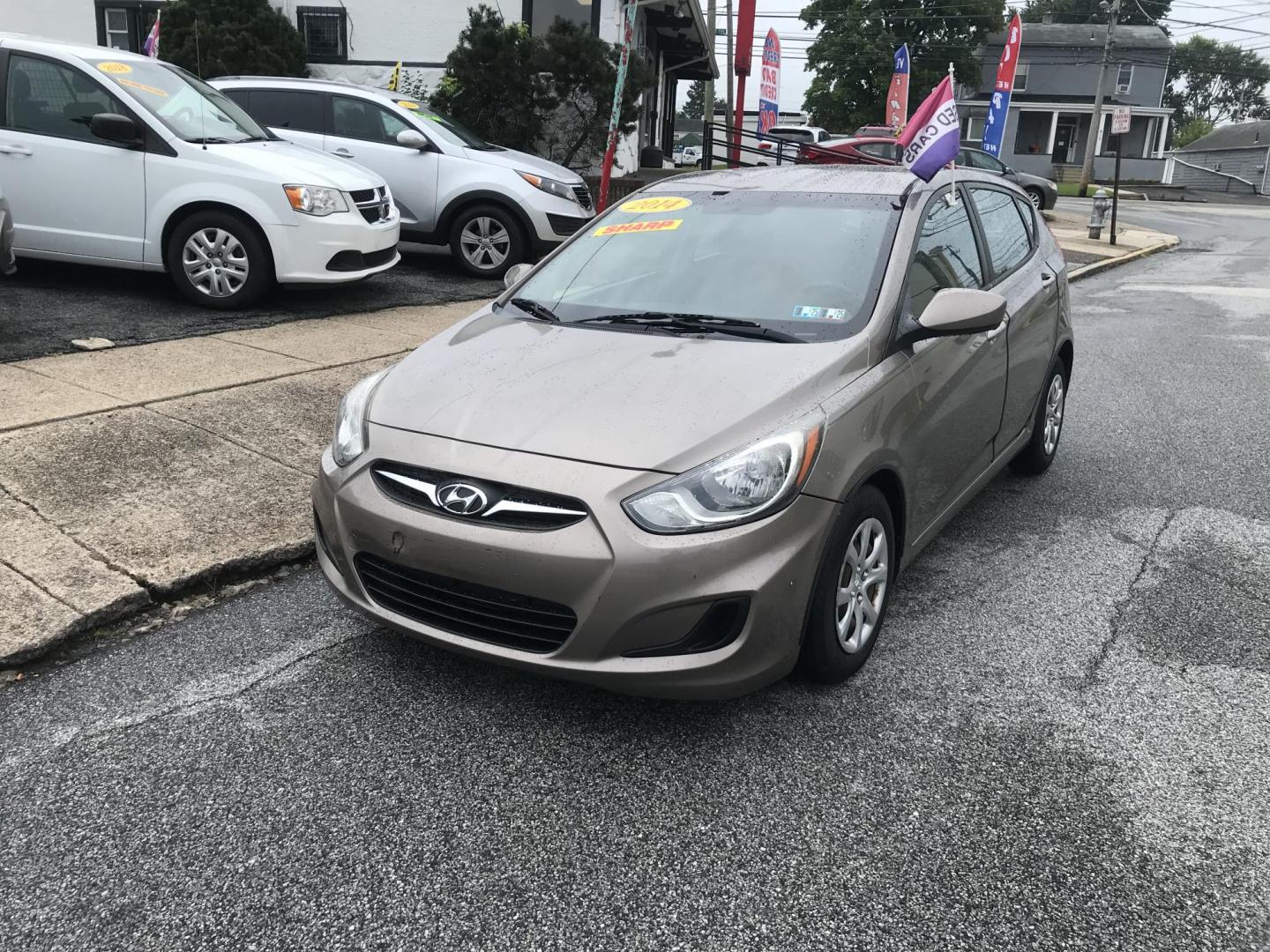 2014 Gold /Tan Hyundai Accent GS 5-Door (KMHCT5AE9EU) with an 1.6L L4 DOHC 16V engine, Automatic transmission, located at 577 Chester Pike, Prospect Park, PA, 19076, (610) 237-1015, 39.886154, -75.302338 - Photo#1