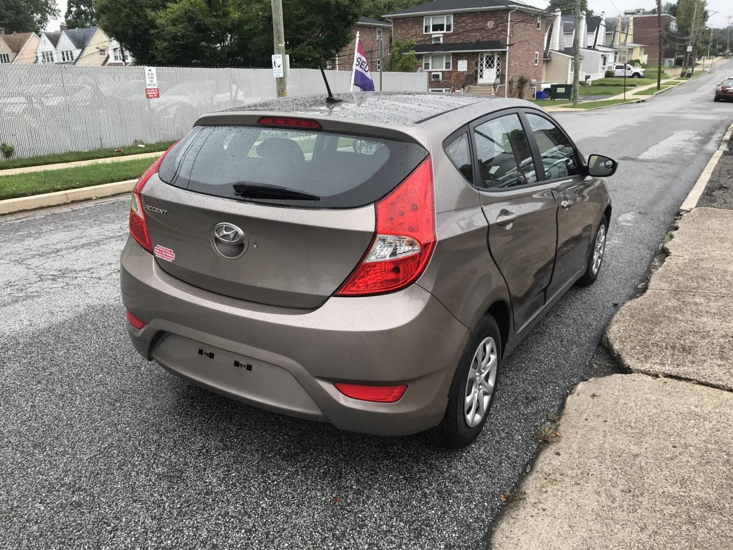 2014 Gold /Tan Hyundai Accent GS 5-Door (KMHCT5AE9EU) with an 1.6L L4 DOHC 16V engine, Automatic transmission, located at 577 Chester Pike, Prospect Park, PA, 19076, (610) 237-1015, 39.886154, -75.302338 - Photo#4