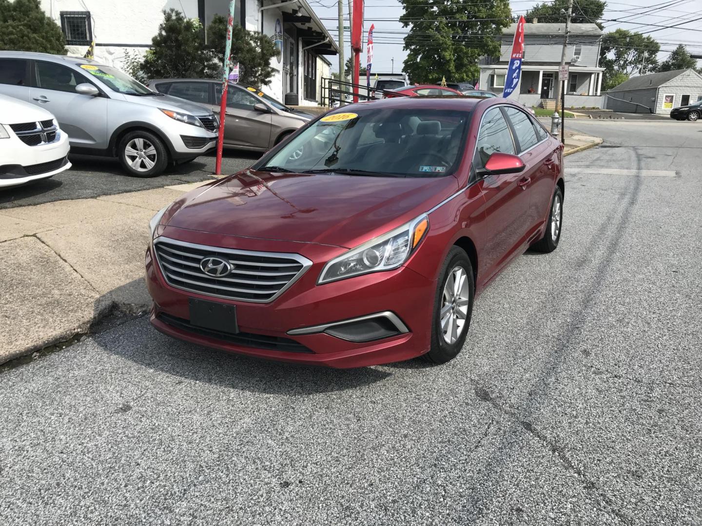 2016 Red /Tan Hyundai Sonata SE (5NPE24AF0GH) with an 2.4L L4 DOHC 16V engine, 7A transmission, located at 577 Chester Pike, Prospect Park, PA, 19076, (610) 237-1015, 39.886154, -75.302338 - 2016 Hyundai Sonata SE: Only 98k miles, backup camera, new PA inspection, aux port, SUPER CLEAN, runs LIKE NEW! This vehicle comes inspected and has been given a bumper to bumper safety check. It is very clean, reliable, and well maintained. We offer a unique pay plan that is known for being the - Photo#2