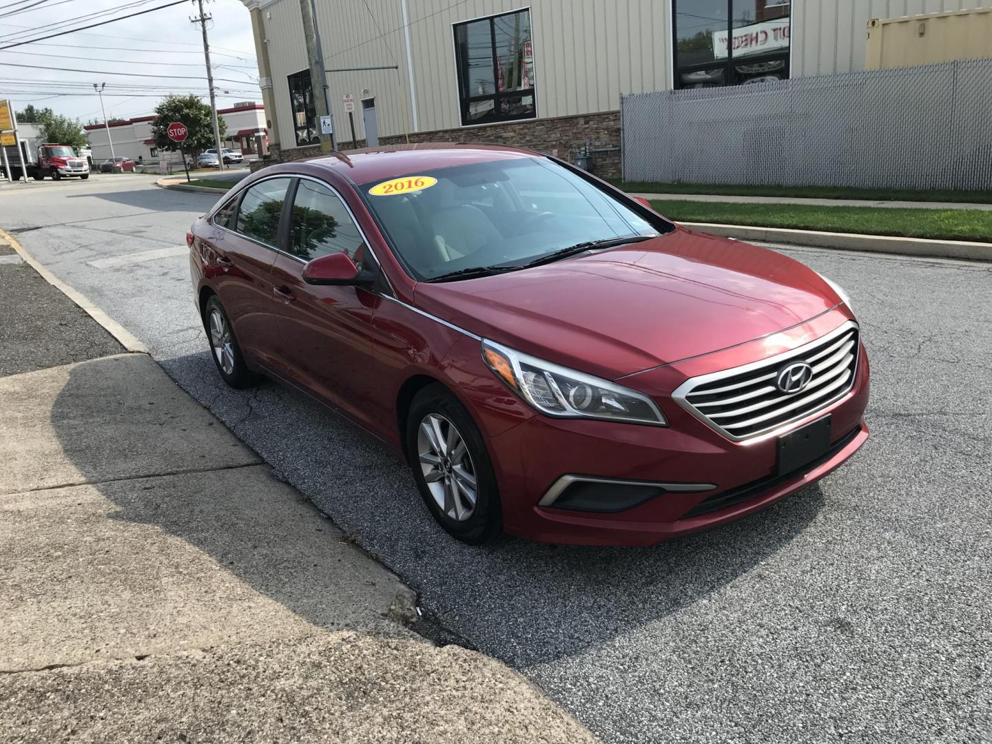 2016 Red /Tan Hyundai Sonata SE (5NPE24AF0GH) with an 2.4L L4 DOHC 16V engine, 7A transmission, located at 577 Chester Pike, Prospect Park, PA, 19076, (610) 237-1015, 39.886154, -75.302338 - 2016 Hyundai Sonata SE: Only 98k miles, backup camera, new PA inspection, aux port, SUPER CLEAN, runs LIKE NEW! This vehicle comes inspected and has been given a bumper to bumper safety check. It is very clean, reliable, and well maintained. We offer a unique pay plan that is known for being the - Photo#3