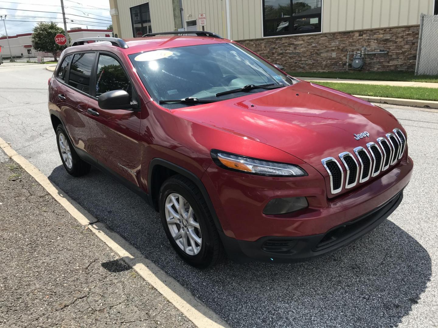 2016 Maroon /Gray Jeep Cherokee Sport 4WD (1C4PJMAB1GW) with an 2.4L L4 DOHC 16V engine, 9A transmission, located at 577 Chester Pike, Prospect Park, PA, 19076, (610) 237-1015, 39.886154, -75.302338 - 2016 Jeep Cherokee: 4x4, backup camera, new PA inspection, SUPER CLEAN, runs LIKE NEW! This vehicle comes inspected and has been given a bumper to bumper safety check. It is very clean, reliable, and well maintained. We offer a unique pay plan that is known for being the easiest and fastest finan - Photo#2