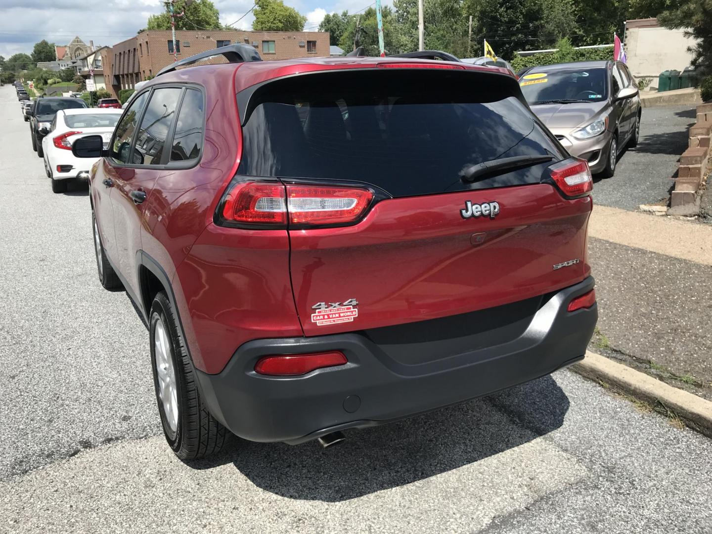 2016 Maroon /Gray Jeep Cherokee Sport 4WD (1C4PJMAB1GW) with an 2.4L L4 DOHC 16V engine, 9A transmission, located at 577 Chester Pike, Prospect Park, PA, 19076, (610) 237-1015, 39.886154, -75.302338 - 2016 Jeep Cherokee: 4x4, backup camera, new PA inspection, SUPER CLEAN, runs LIKE NEW! This vehicle comes inspected and has been given a bumper to bumper safety check. It is very clean, reliable, and well maintained. We offer a unique pay plan that is known for being the easiest and fastest finan - Photo#4