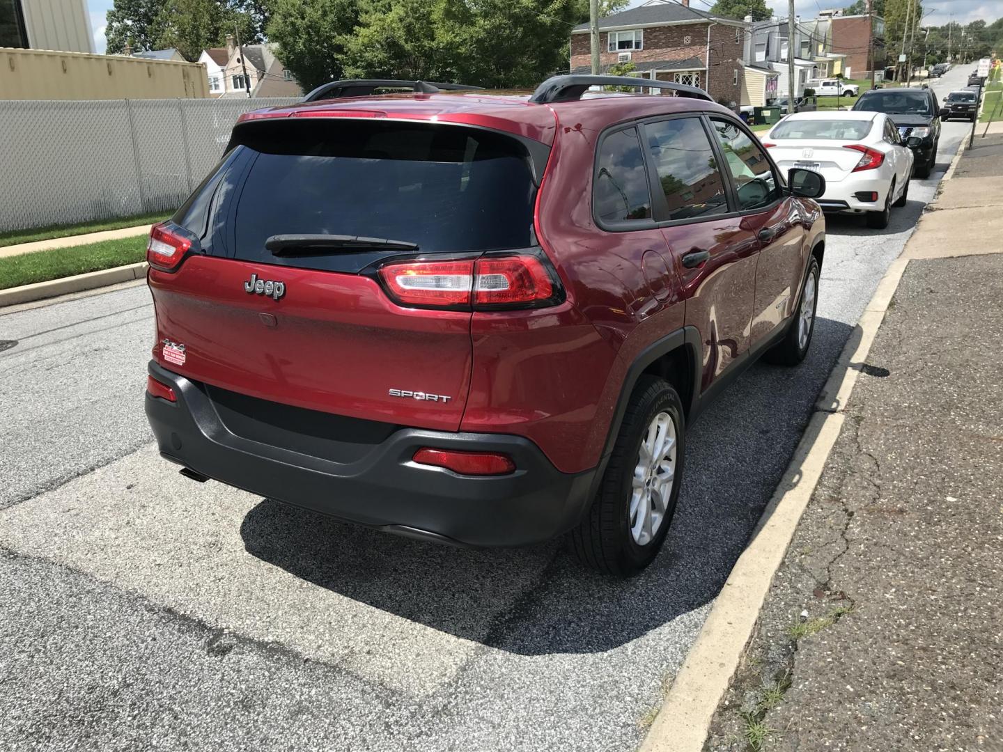 2016 Maroon /Gray Jeep Cherokee Sport 4WD (1C4PJMAB1GW) with an 2.4L L4 DOHC 16V engine, 9A transmission, located at 577 Chester Pike, Prospect Park, PA, 19076, (610) 237-1015, 39.886154, -75.302338 - 2016 Jeep Cherokee: 4x4, backup camera, new PA inspection, SUPER CLEAN, runs LIKE NEW! This vehicle comes inspected and has been given a bumper to bumper safety check. It is very clean, reliable, and well maintained. We offer a unique pay plan that is known for being the easiest and fastest finan - Photo#6