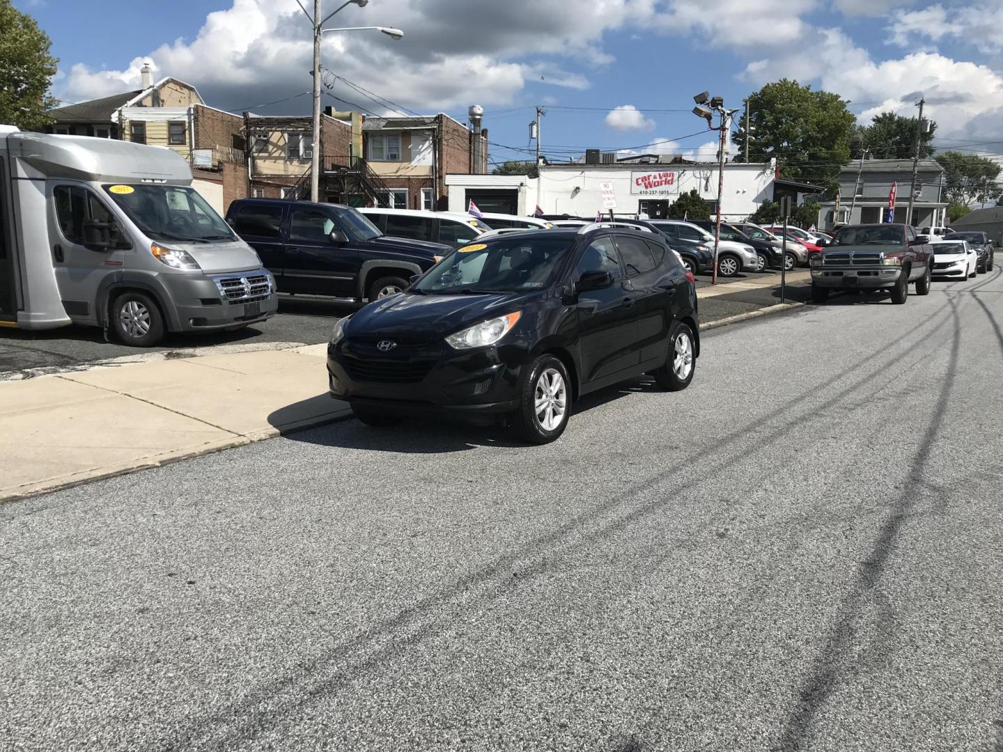 2011 Black /Black Hyundai Tucson GLS (KM8JU3AC9BU) with an 2.4L L4 DOHC 16V engine, 6-Speed Automatic transmission, located at 577 Chester Pike, Prospect Park, PA, 19076, (610) 237-1015, 39.886154, -75.302338 - 2011 Hyundai Tucson GLS: Great on gas, new PA inspection, SUPER CLEAN, runs LIKE NEW! This vehicle comes inspected and has been given a bumper to bumper safety check. It is very clean, reliable, and well maintained. We offer a unique pay plan that is known for being the easiest and fastest financ - Photo#1