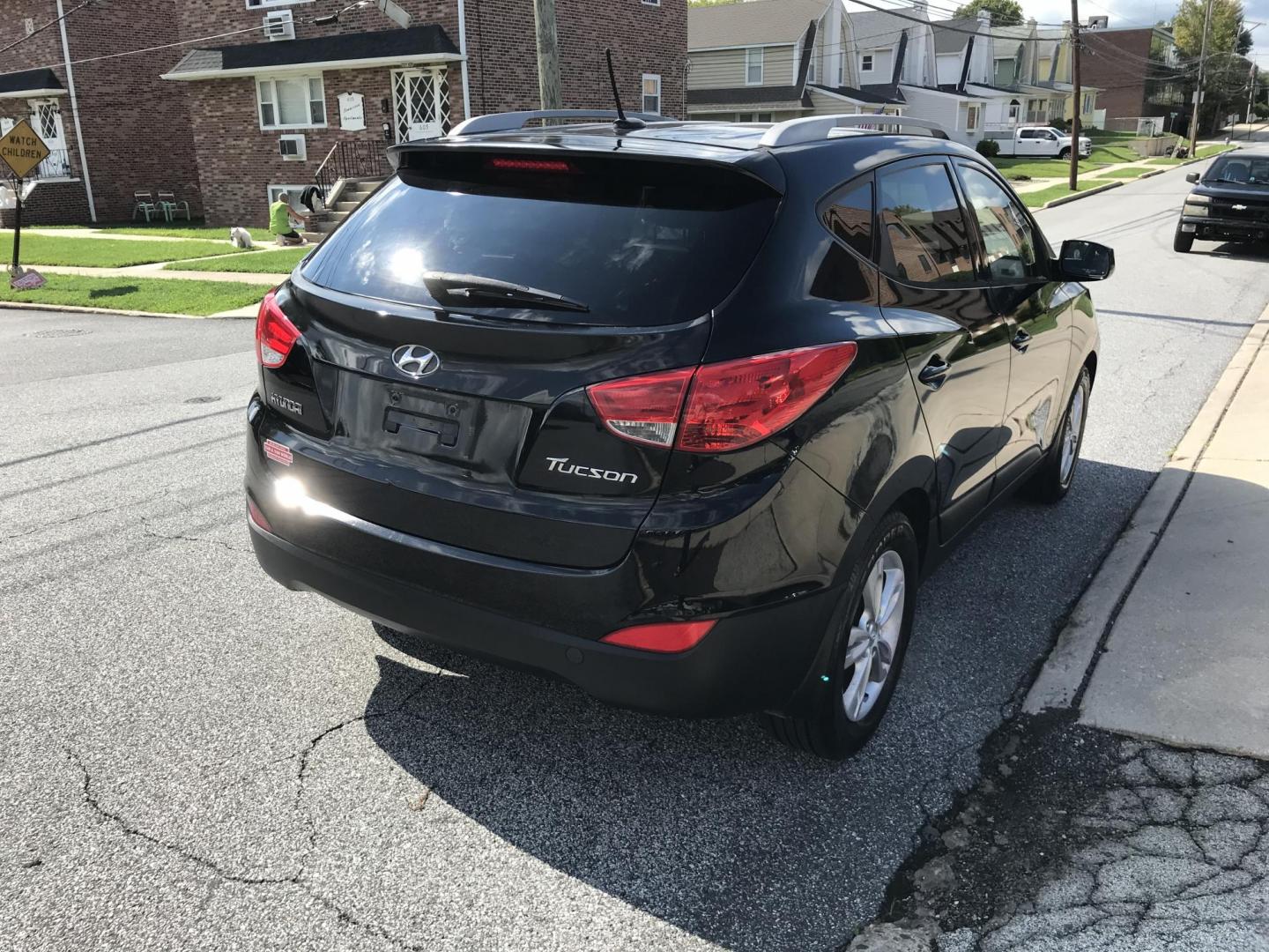 2011 Black /Black Hyundai Tucson GLS (KM8JU3AC9BU) with an 2.4L L4 DOHC 16V engine, 6-Speed Automatic transmission, located at 577 Chester Pike, Prospect Park, PA, 19076, (610) 237-1015, 39.886154, -75.302338 - 2011 Hyundai Tucson GLS: Great on gas, new PA inspection, SUPER CLEAN, runs LIKE NEW! This vehicle comes inspected and has been given a bumper to bumper safety check. It is very clean, reliable, and well maintained. We offer a unique pay plan that is known for being the easiest and fastest financ - Photo#4