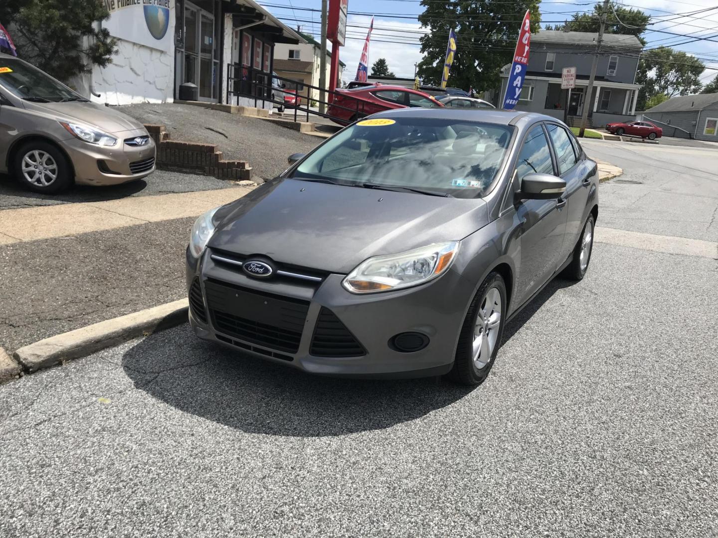 2013 Gray /Gray Ford Focus SE Sedan (1FADP3F2XDL) with an 2.0L L4 DOHC 16V engine, Automatic transmission, located at 577 Chester Pike, Prospect Park, PA, 19076, (610) 237-1015, 39.886154, -75.302338 - 2013 Ford Focus: Only 93k miles, great on gas, new PA inspection, runs LIKE NEW! This vehicle comes inspected and has been given a bumper to bumper safety check. It is very clean, reliable, and well maintained. We offer a unique pay plan that is known for being the easiest and fastest financing o - Photo#2