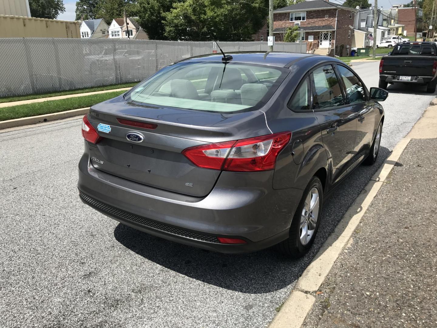 2013 Gray /Gray Ford Focus SE Sedan (1FADP3F2XDL) with an 2.0L L4 DOHC 16V engine, Automatic transmission, located at 577 Chester Pike, Prospect Park, PA, 19076, (610) 237-1015, 39.886154, -75.302338 - 2013 Ford Focus: Only 93k miles, great on gas, new PA inspection, runs LIKE NEW! This vehicle comes inspected and has been given a bumper to bumper safety check. It is very clean, reliable, and well maintained. We offer a unique pay plan that is known for being the easiest and fastest financing o - Photo#5