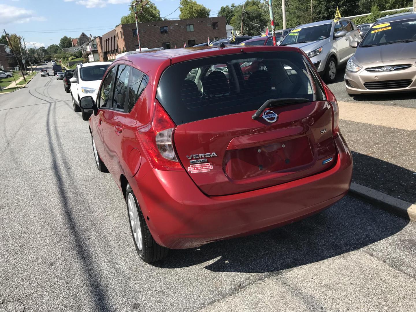 2014 Red /Gray Nissan Versa Note S (3N1CE2CP5EL) with an 1.6L L4 DOHC 16V engine, Automatic transmission, located at 577 Chester Pike, Prospect Park, PA, 19076, (610) 237-1015, 39.886154, -75.302338 - Photo#5