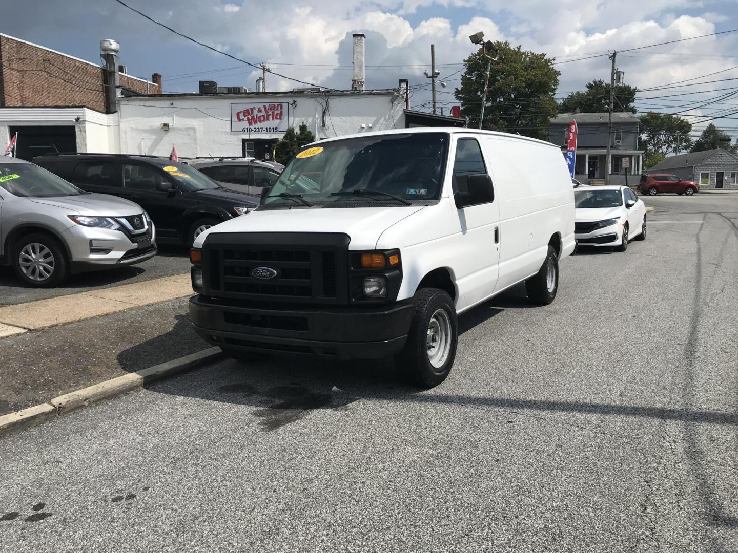 2012 White /Gray Ford E-Series Van E-250 Extended (1FTNS2EL9CD) with an 5.4L V8 SOHC 16V FFV engine, 4-Speed Automatic transmission, located at 577 Chester Pike, Prospect Park, PA, 19076, (610) 237-1015, 39.886154, -75.302338 - 2012 Ford Econoline E250 Extended Body: Only 137k miles, new PA inspection, partition, shelving, runs LIKE NEW! This vehicle comes inspected and has been given a bumper to bumper safety check. It is very clean, reliable, and well maintained. We offer a unique pay plan that is known for being the - Photo#1