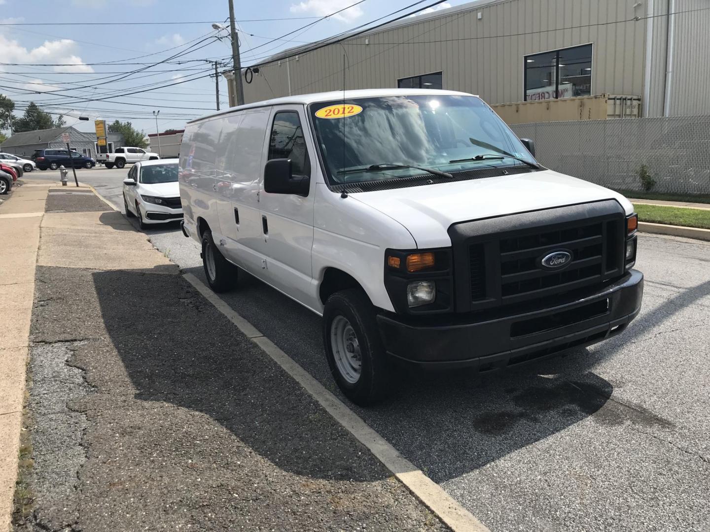 2012 White /Gray Ford E-Series Van E-250 Extended (1FTNS2EL9CD) with an 5.4L V8 SOHC 16V FFV engine, 4-Speed Automatic transmission, located at 577 Chester Pike, Prospect Park, PA, 19076, (610) 237-1015, 39.886154, -75.302338 - 2012 Ford Econoline E250 Extended Body: Only 137k miles, new PA inspection, partition, shelving, runs LIKE NEW! This vehicle comes inspected and has been given a bumper to bumper safety check. It is very clean, reliable, and well maintained. We offer a unique pay plan that is known for being the - Photo#3