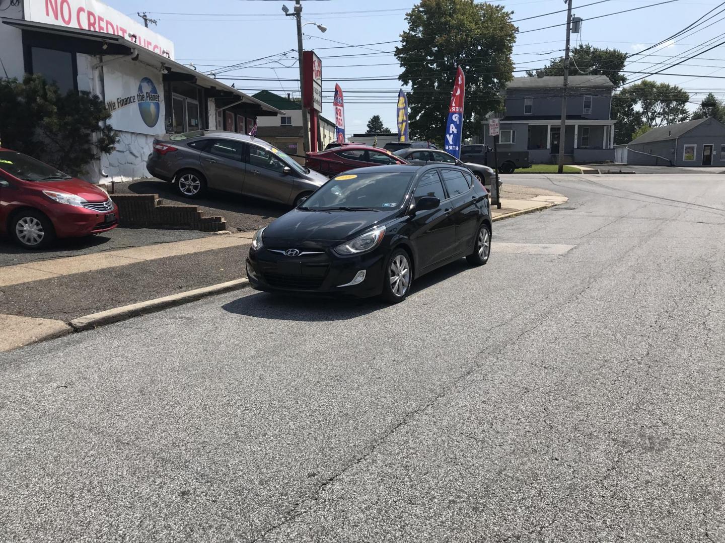 2012 Black /Gray Hyundai Accent GS 5-Door (KMHCU5AE5CU) with an 1.6L L4 DOHC 16V engine, Automatic transmission, located at 577 Chester Pike, Prospect Park, PA, 19076, (610) 237-1015, 39.886154, -75.302338 - 2012 Hyundai Accent Hatchback: Only 136k miles, great on gas, aux port, new PA inspection, RUNS LIKE NEW! This vehicle comes inspected and has been given a bumper to bumper safety check. It is very clean, reliable, and well maintained. We offer a unique pay plan that is known for being the easies - Photo#1