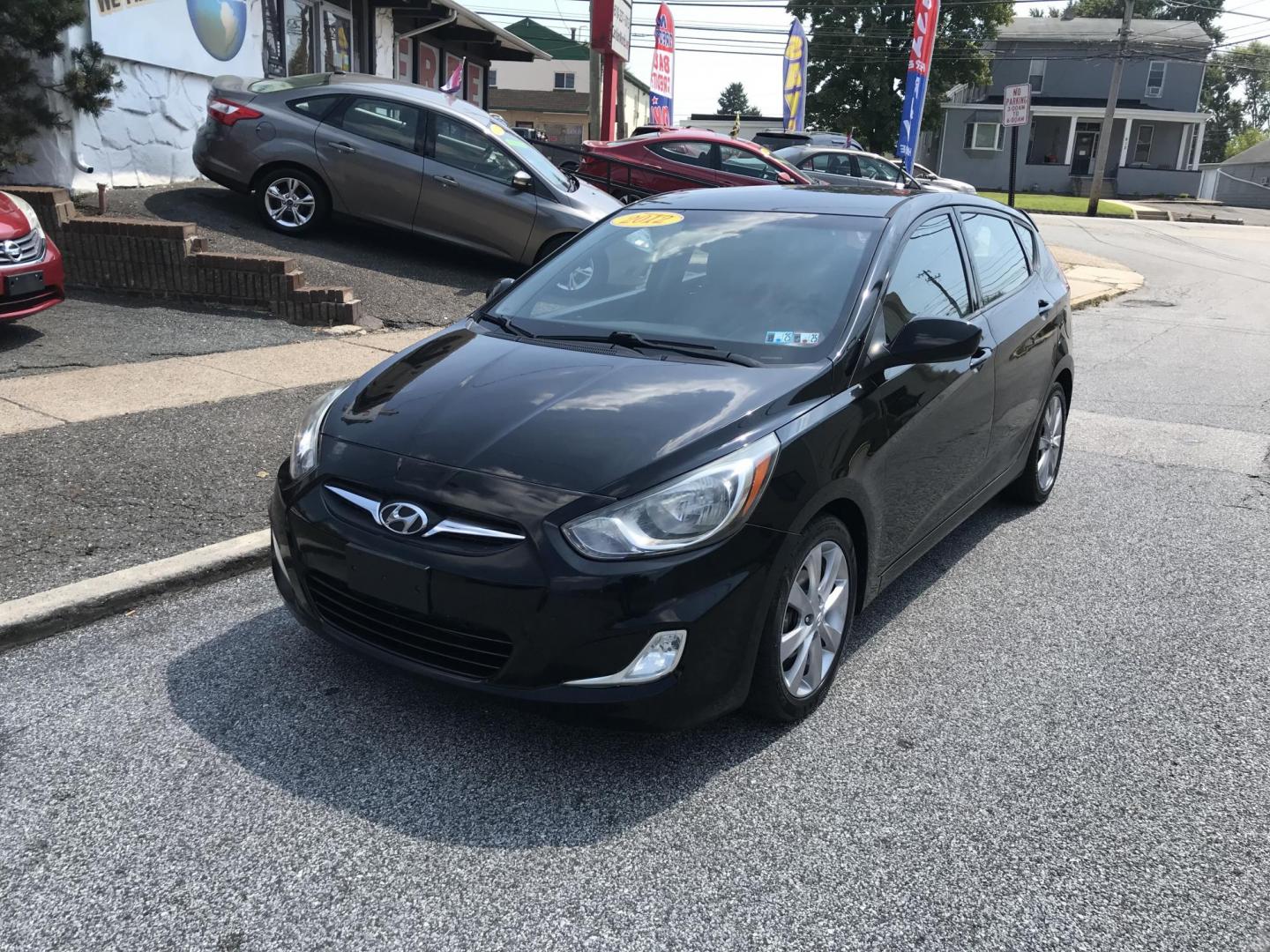 2012 Black /Gray Hyundai Accent GS 5-Door (KMHCU5AE5CU) with an 1.6L L4 DOHC 16V engine, Automatic transmission, located at 577 Chester Pike, Prospect Park, PA, 19076, (610) 237-1015, 39.886154, -75.302338 - 2012 Hyundai Accent Hatchback: Only 136k miles, great on gas, aux port, new PA inspection, RUNS LIKE NEW! This vehicle comes inspected and has been given a bumper to bumper safety check. It is very clean, reliable, and well maintained. We offer a unique pay plan that is known for being the easies - Photo#2