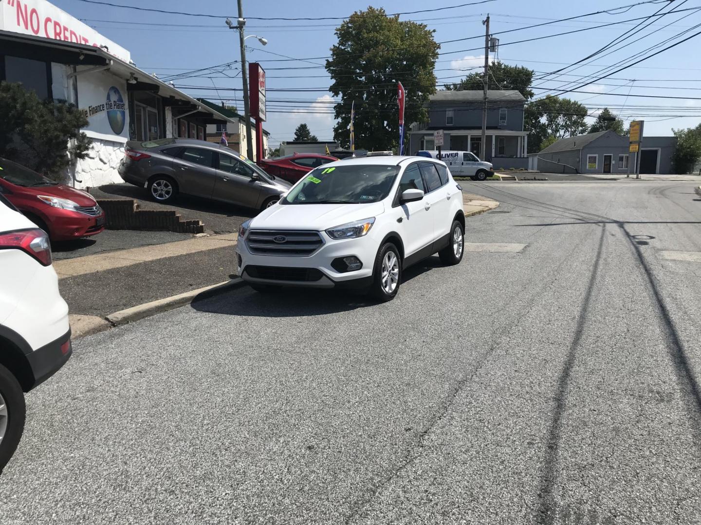 2019 White /Gray Ford Escape SE 4WD (1FMCU9GD6KU) with an 1.5L L4 DOHC 16V engine, 6A transmission, located at 577 Chester Pike, Prospect Park, PA, 19076, (610) 237-1015, 39.886154, -75.302338 - 2019 Ford Escape: Only 116k miles, backup camera, 4x4, new PA inspection, SUPER CLEAN, runs LIKE NEW! This vehicle comes inspected and has been given a bumper to bumper safety check. It is very clean, reliable, and well maintained. We offer a unique pay plan that is known for being the easiest an - Photo#2