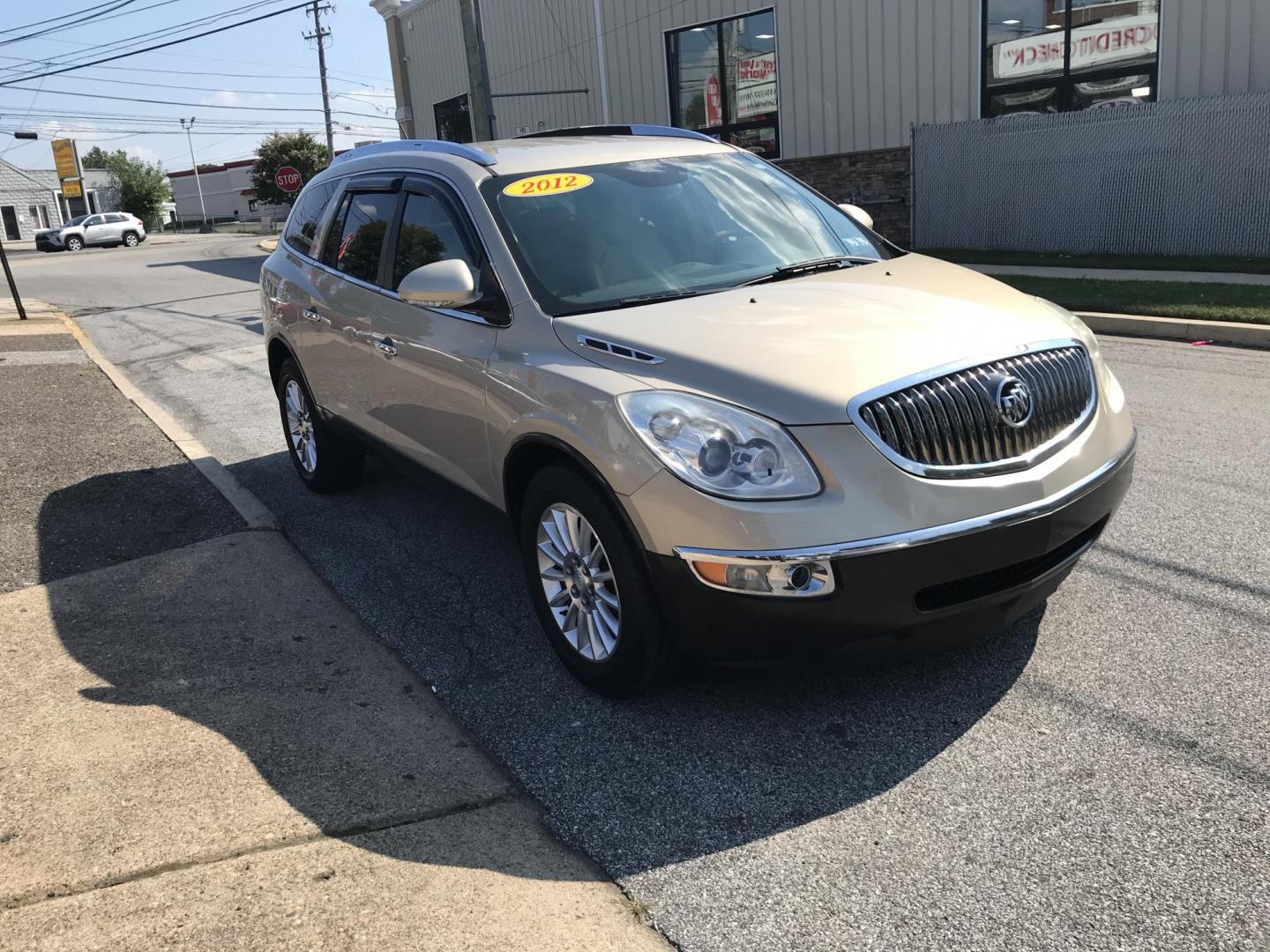 2012 Gold /Beige Buick Enclave Leather FWD (5GAKRCED3CJ) with an 3.6L V6 DOHC 24V engine, 6-Speed Automatic Overdrive transmission, located at 577 Chester Pike, Prospect Park, PA, 19076, (610) 237-1015, 39.886154, -75.302338 - 2012 Buick Enclave: Only 128k miles, 3rd row seating, backup camera, new PA inspection, SUPER CLEAN! This vehicle comes inspected and has been given a bumper to bumper safety check. It is very clean, reliable, and well maintained. We offer a unique pay plan that is known for being the easiest and - Photo#2