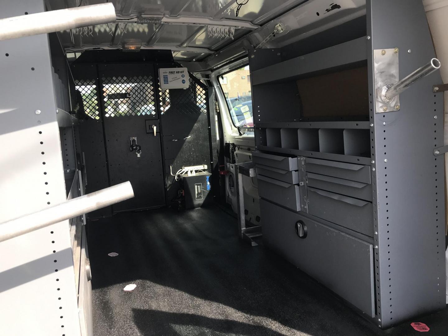 2014 White /Gray Ford Econoline E150 E-150 (1FTNE1EW5ED) with an 4.6L V8 SOHC 16V engine, 4-Speed Automatic transmission, located at 577 Chester Pike, Prospect Park, PA, 19076, (610) 237-1015, 39.886154, -75.302338 - 2014 Ford Econoline E150 Cargo Van: Only 120k miles, has shelving, power inverter, new PA inspection, runs LIKE NEW! This vehicle comes inspected and has been given a bumper to bumper safety check. It is very clean, reliable, and well maintained. We offer a unique pay plan that is known for being - Photo#15