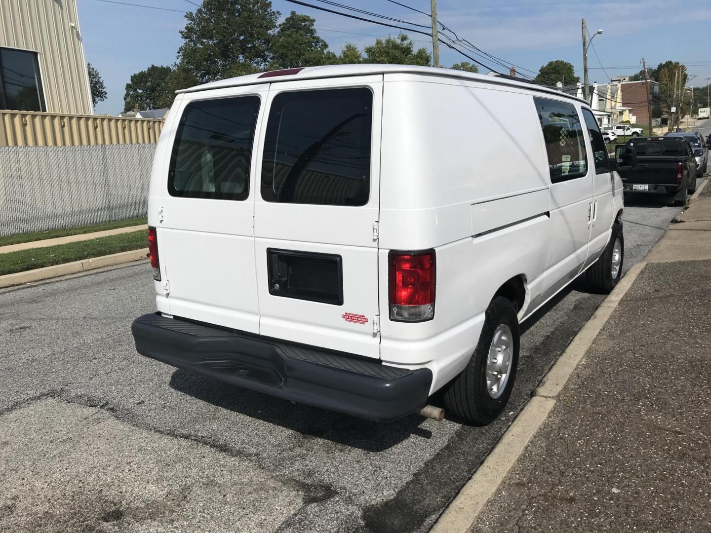 2014 White /Gray Ford Econoline E150 E-150 (1FTNE1EW5ED) with an 4.6L V8 SOHC 16V engine, 4-Speed Automatic transmission, located at 577 Chester Pike, Prospect Park, PA, 19076, (610) 237-1015, 39.886154, -75.302338 - 2014 Ford Econoline E150 Cargo Van: Only 120k miles, has shelving, power inverter, new PA inspection, runs LIKE NEW! This vehicle comes inspected and has been given a bumper to bumper safety check. It is very clean, reliable, and well maintained. We offer a unique pay plan that is known for being - Photo#4