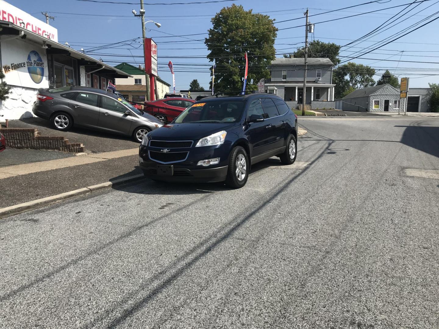 2010 Blue /Tan Chevrolet Traverse LT1 FWD (1GNLRGED1AJ) with an 3.6L V6 DOHC 24V engine, 6-Speed Automatic transmission, located at 577 Chester Pike, Prospect Park, PA, 19076, (610) 237-1015, 39.886154, -75.302338 - Photo#1