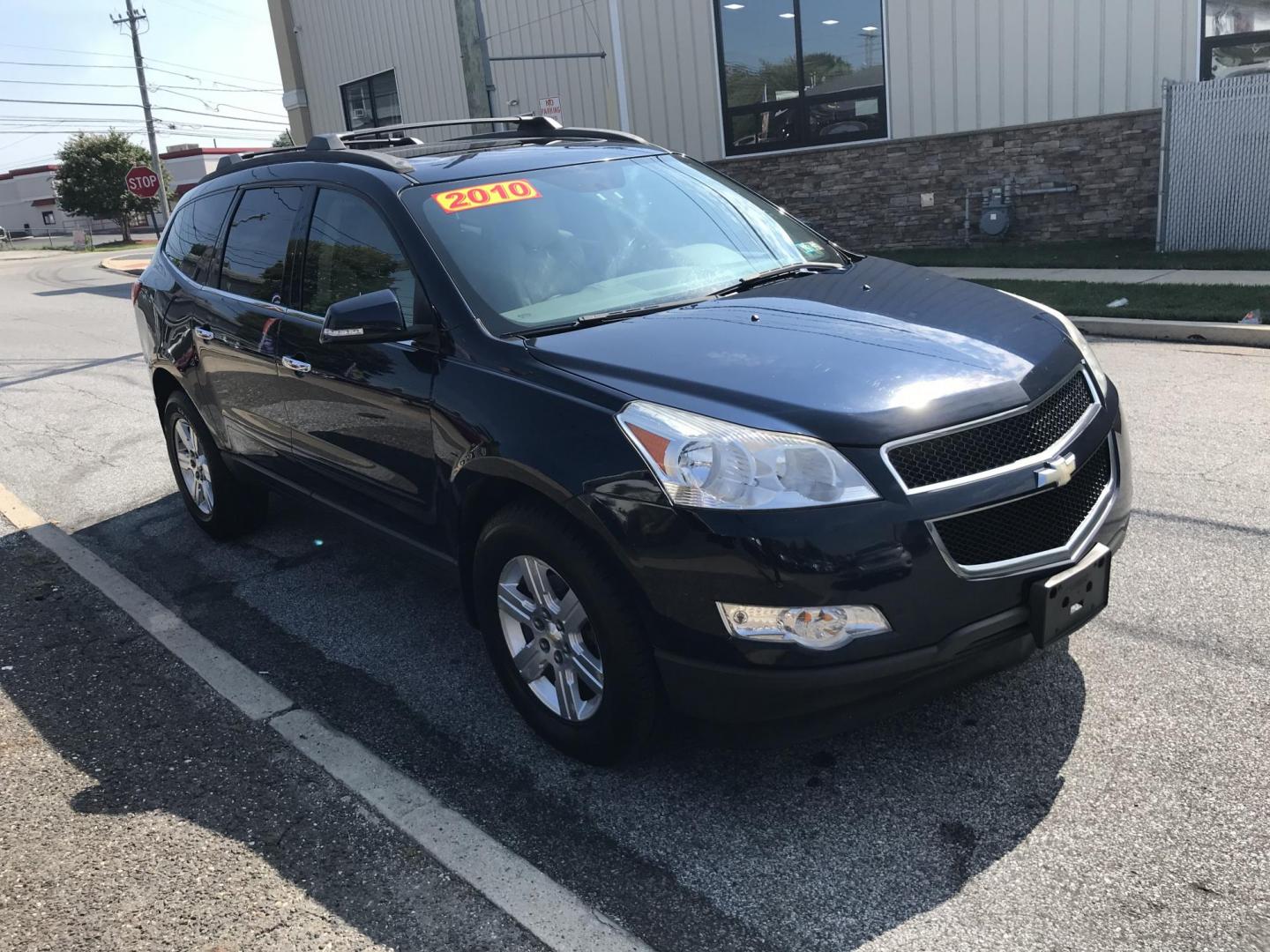 2010 Blue /Tan Chevrolet Traverse LT1 FWD (1GNLRGED1AJ) with an 3.6L V6 DOHC 24V engine, 6-Speed Automatic transmission, located at 577 Chester Pike, Prospect Park, PA, 19076, (610) 237-1015, 39.886154, -75.302338 - Photo#2