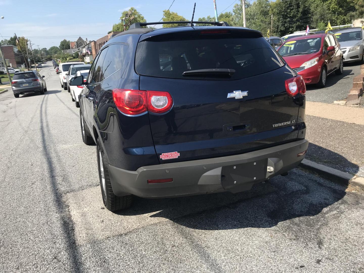 2010 Blue /Tan Chevrolet Traverse LT1 FWD (1GNLRGED1AJ) with an 3.6L V6 DOHC 24V engine, 6-Speed Automatic transmission, located at 577 Chester Pike, Prospect Park, PA, 19076, (610) 237-1015, 39.886154, -75.302338 - Photo#5