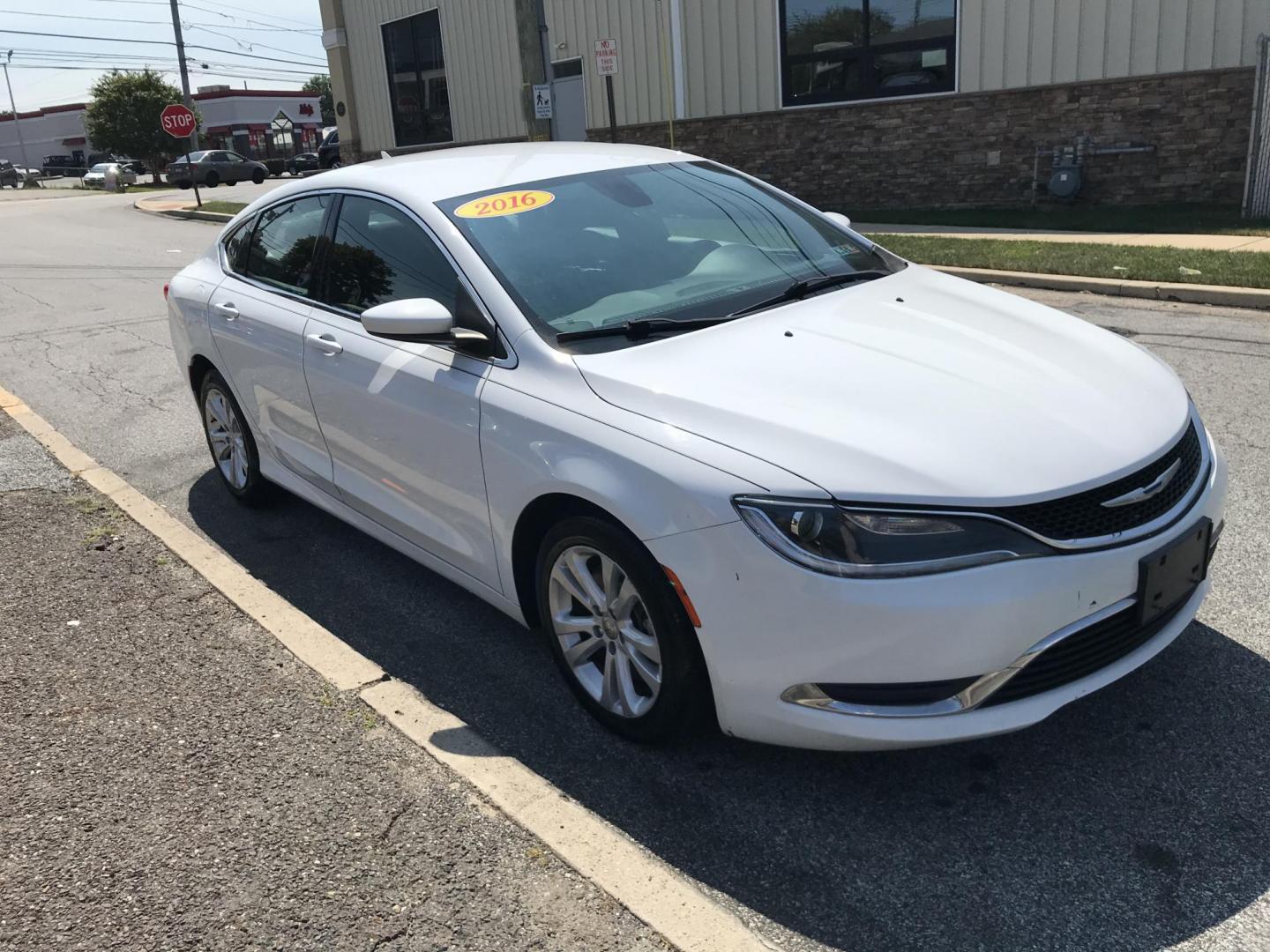 2016 White /Gray Chrysler 200 Limited (1C3CCCAG1GN) with an 3.6L V6 DOHC 24V FFV engine, 9A transmission, located at 577 Chester Pike, Prospect Park, PA, 19076, (610) 237-1015, 39.886154, -75.302338 - 2016 Chrysler 200 Limited: Big screen radio, backup camera, new PA inspection, great on gas, runs LIKE NEW! This vehicle comes inspected and has been given a bumper to bumper safety check. It is very clean, reliable, and well maintained. We offer a unique pay plan that is known for being the easi - Photo#3