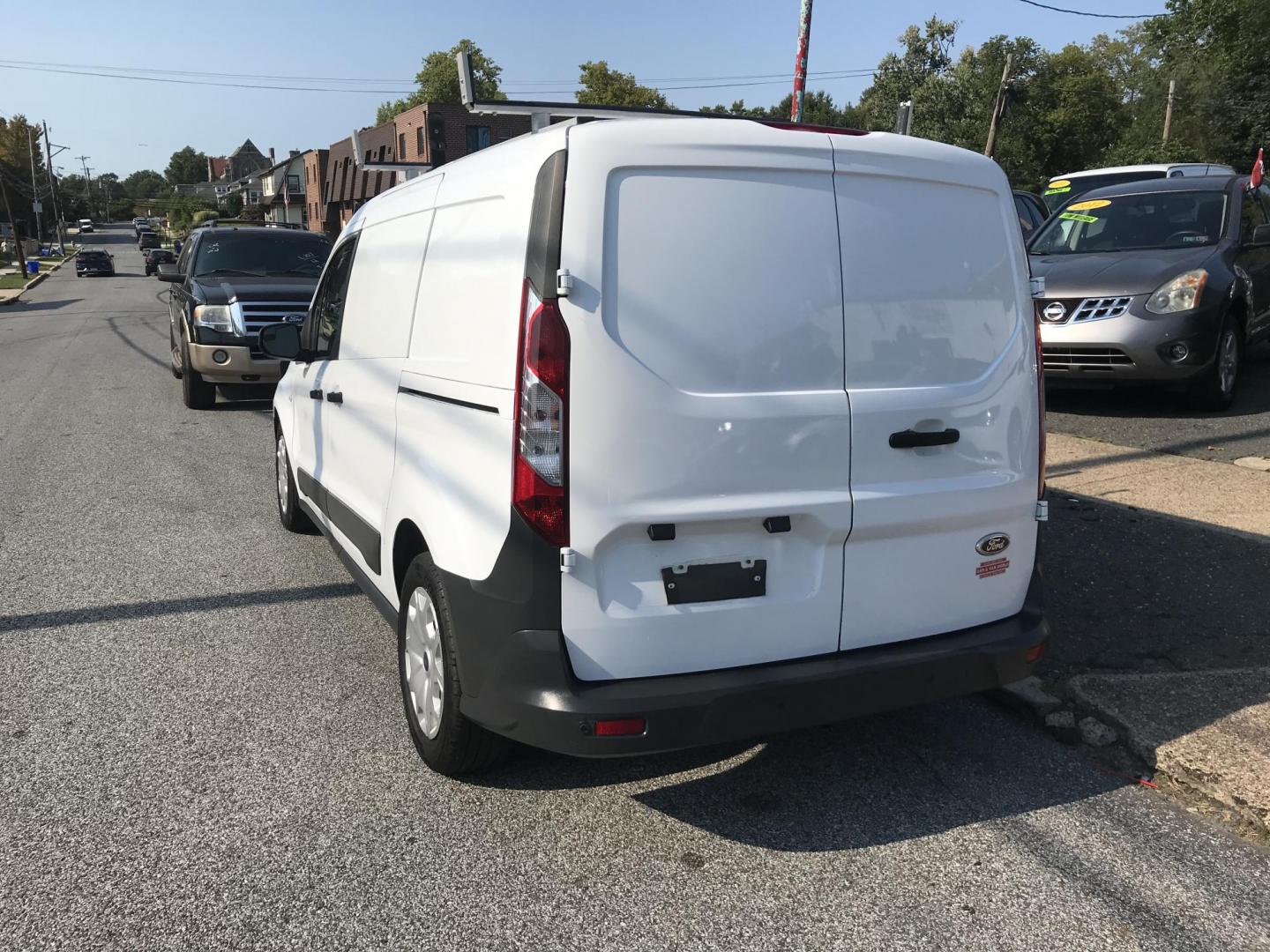 2014 White /Gray Ford Transit Connect XL LWB (NM0LS7E79E1) with an 2.5L L4 DOHC 16V engine, 6-Speed Automatic transmission, located at 577 Chester Pike, Prospect Park, PA, 19076, (610) 237-1015, 39.886154, -75.302338 - 2014 Ford Transit Connect XL: Only 80k miles, new PA inspection, no side or rear windows, runs LIKE NEW! This vehicle comes inspected and has been given a bumper to bumper safety check. It is very clean, reliable, and well maintained. We offer a unique pay plan that is known for being the easiest - Photo#4