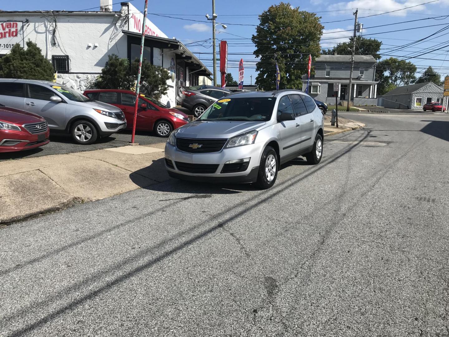 2014 Silver /Gray Chevrolet Traverse LS FWD w/PDC (1GNKRFED8EJ) with an 3.6L V6 DOHC 24V engine, 6-Speed Automatic transmission, located at 577 Chester Pike, Prospect Park, PA, 19076, (610) 237-1015, 39.886154, -75.302338 - Photo#2