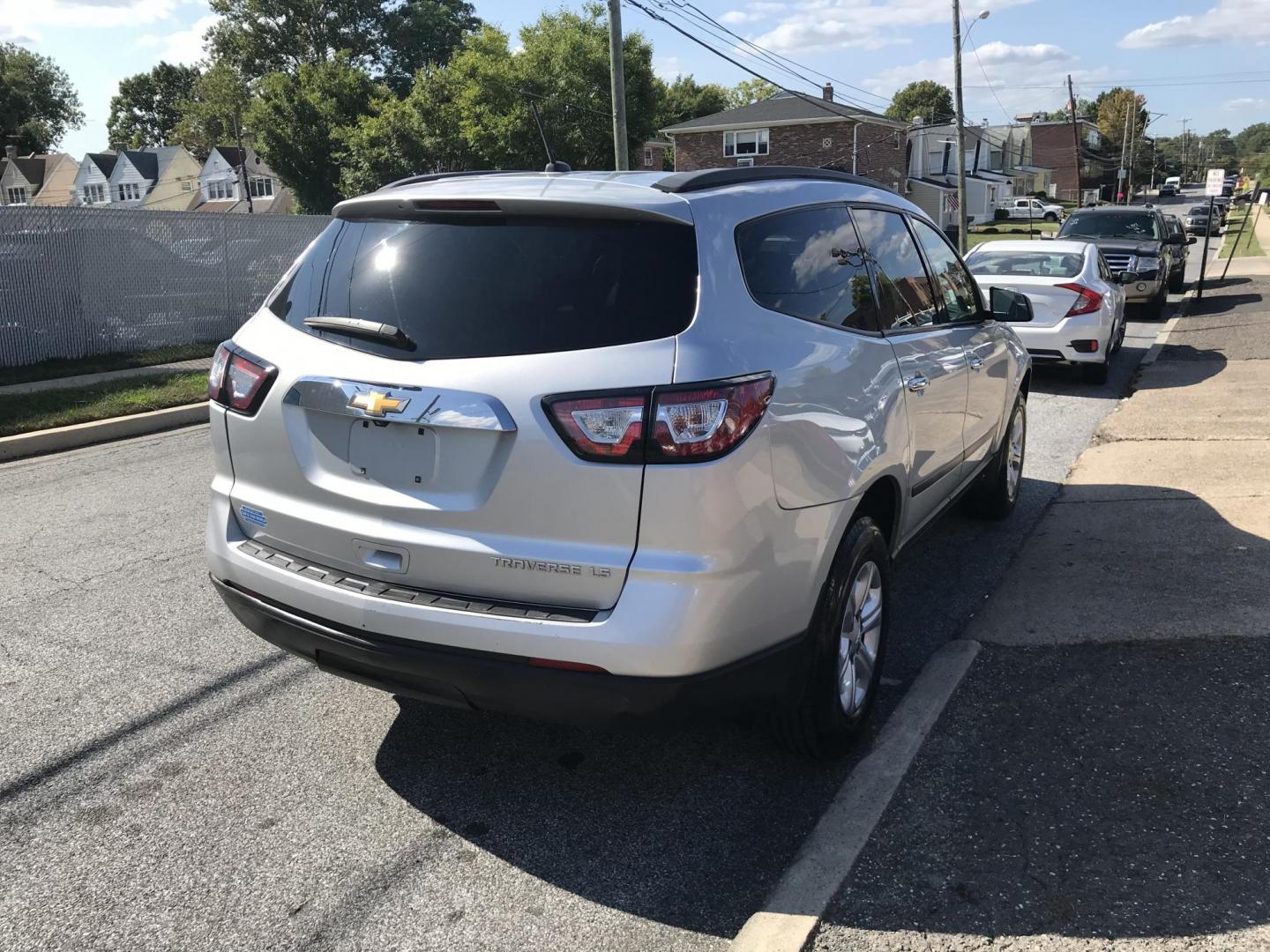 2014 Silver /Gray Chevrolet Traverse LS FWD w/PDC (1GNKRFED8EJ) with an 3.6L V6 DOHC 24V engine, 6-Speed Automatic transmission, located at 577 Chester Pike, Prospect Park, PA, 19076, (610) 237-1015, 39.886154, -75.302338 - Photo#4