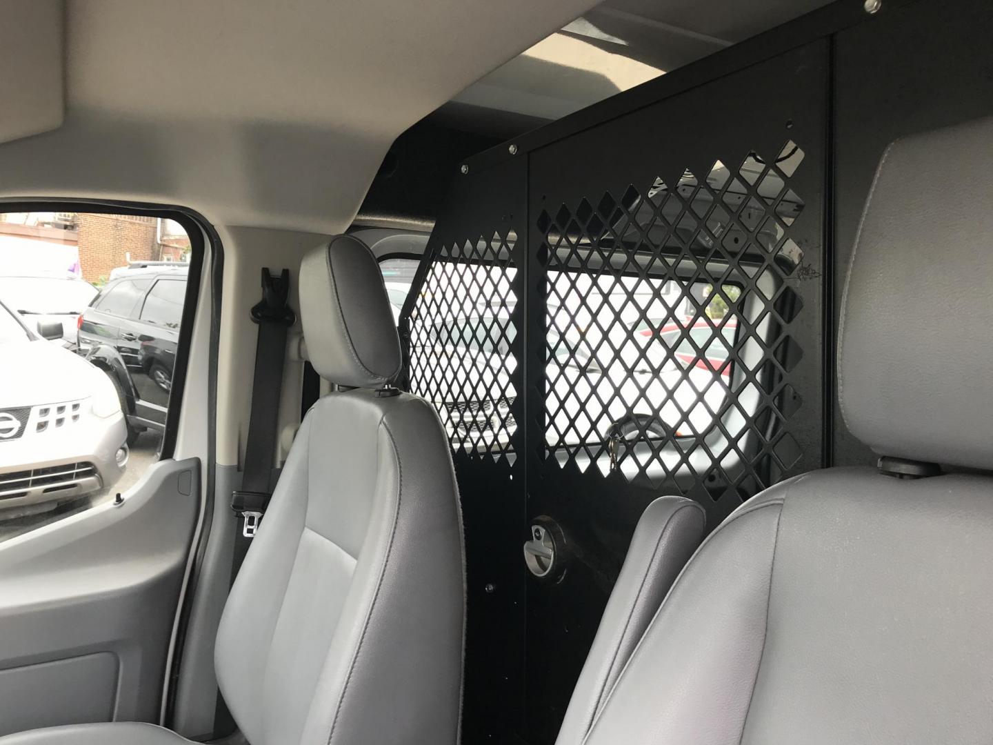 2015 White /Gray Ford Transit 150 Van Low Roof w/Sliding Pass. 130-in. WB (1FTNE1YM7FK) with an 3.7L V6 DOHC 24V engine, 6-Speed Automatic transmission, located at 577 Chester Pike, Prospect Park, PA, 19076, (610) 237-1015, 39.886154, -75.302338 - 2015 Ford Transit 150 Low Roof: Only 135k miles, ladder racks, multiple pieces of shelving, partition, new PA inspection, FLEET MAINTAINED, runs LIKE NEW! This vehicle comes inspected and has been given a bumper to bumper safety check. It is very clean, reliable, and well maintained. We offer a u - Photo#10