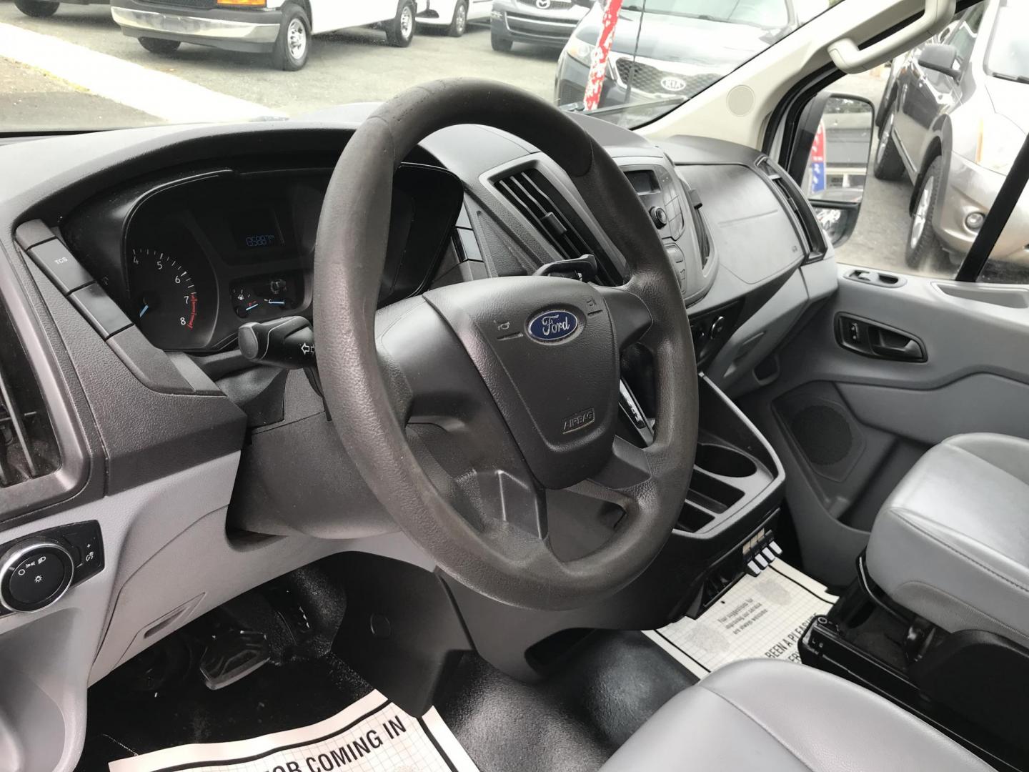 2015 White /Gray Ford Transit 150 Van Low Roof w/Sliding Pass. 130-in. WB (1FTNE1YM7FK) with an 3.7L V6 DOHC 24V engine, 6-Speed Automatic transmission, located at 577 Chester Pike, Prospect Park, PA, 19076, (610) 237-1015, 39.886154, -75.302338 - 2015 Ford Transit 150 Low Roof: Only 135k miles, ladder racks, multiple pieces of shelving, partition, new PA inspection, FLEET MAINTAINED, runs LIKE NEW! This vehicle comes inspected and has been given a bumper to bumper safety check. It is very clean, reliable, and well maintained. We offer a u - Photo#11