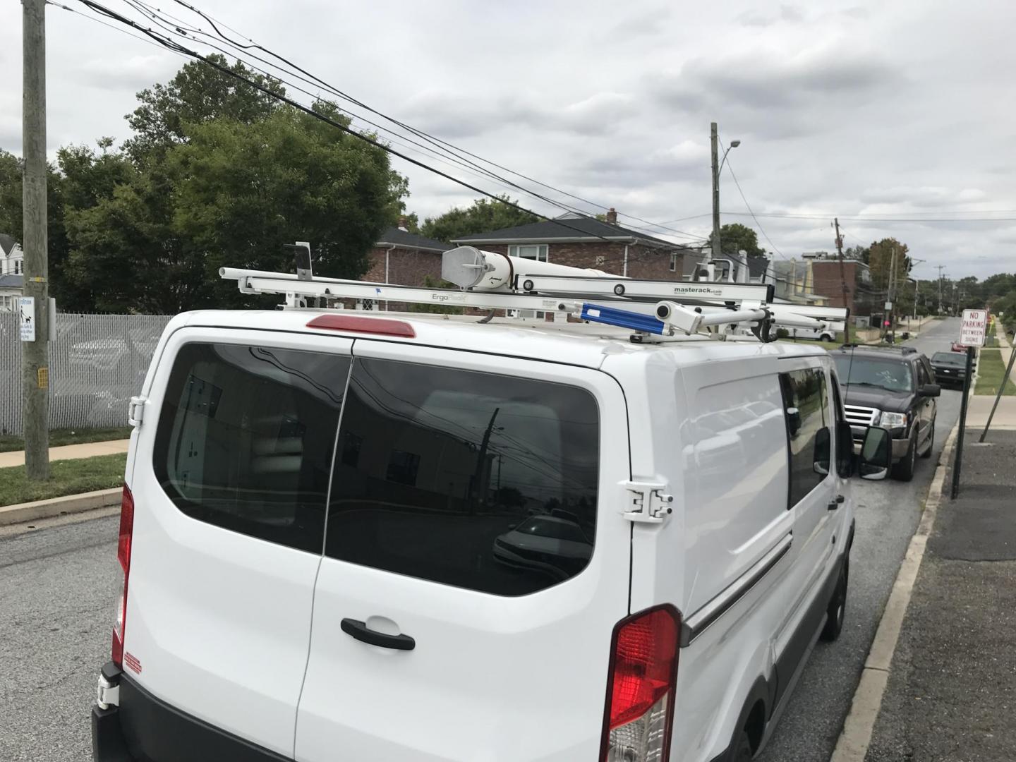 2015 White /Gray Ford Transit 150 Van Low Roof w/Sliding Pass. 130-in. WB (1FTNE1YM7FK) with an 3.7L V6 DOHC 24V engine, 6-Speed Automatic transmission, located at 577 Chester Pike, Prospect Park, PA, 19076, (610) 237-1015, 39.886154, -75.302338 - 2015 Ford Transit 150 Low Roof: Only 135k miles, ladder racks, multiple pieces of shelving, partition, new PA inspection, FLEET MAINTAINED, runs LIKE NEW! This vehicle comes inspected and has been given a bumper to bumper safety check. It is very clean, reliable, and well maintained. We offer a u - Photo#19