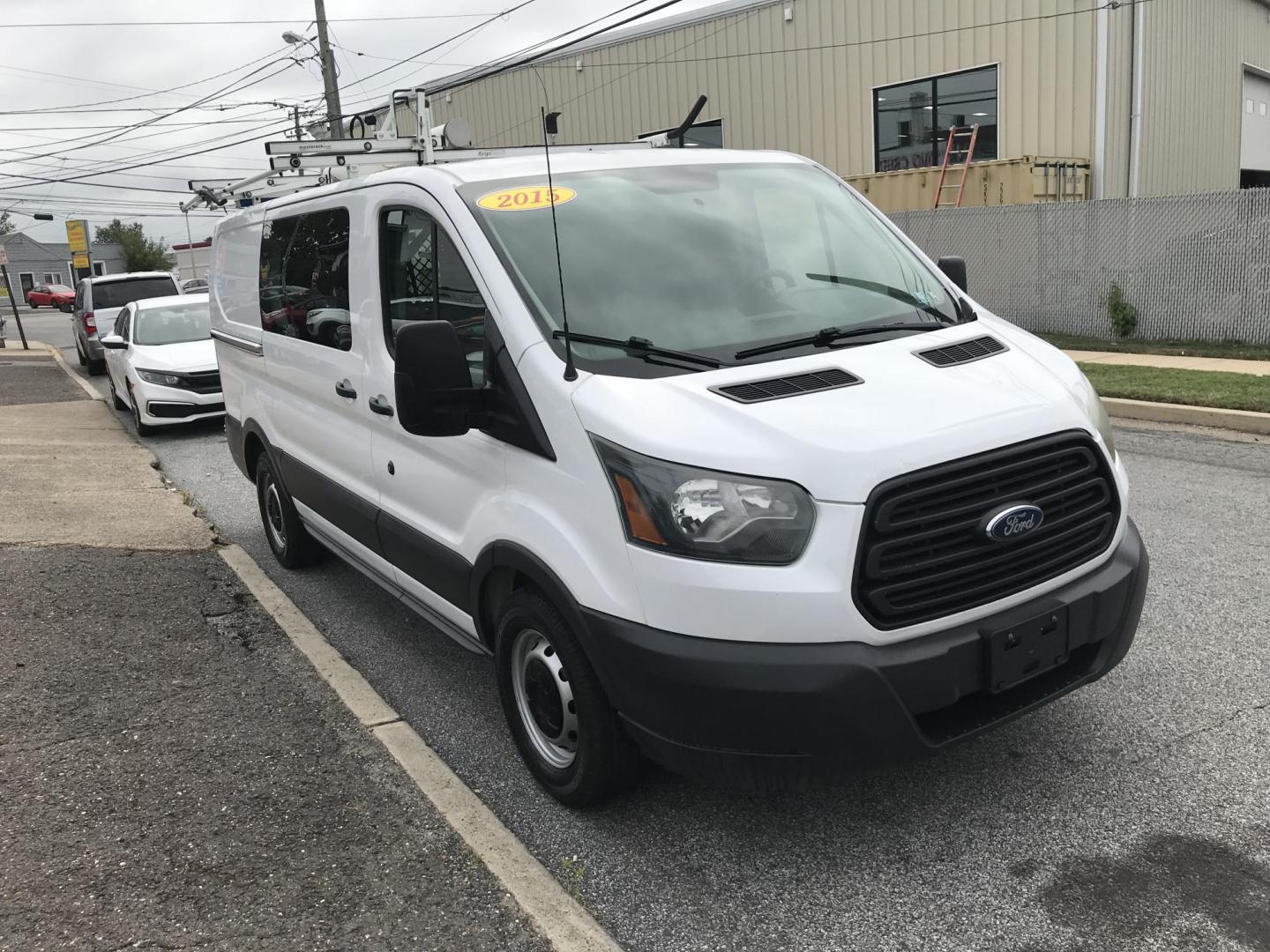 2015 White /Gray Ford Transit 150 Van Low Roof w/Sliding Pass. 130-in. WB (1FTNE1YM7FK) with an 3.7L V6 DOHC 24V engine, 6-Speed Automatic transmission, located at 577 Chester Pike, Prospect Park, PA, 19076, (610) 237-1015, 39.886154, -75.302338 - 2015 Ford Transit 150 Low Roof: Only 135k miles, ladder racks, multiple pieces of shelving, partition, new PA inspection, FLEET MAINTAINED, runs LIKE NEW! This vehicle comes inspected and has been given a bumper to bumper safety check. It is very clean, reliable, and well maintained. We offer a u - Photo#3