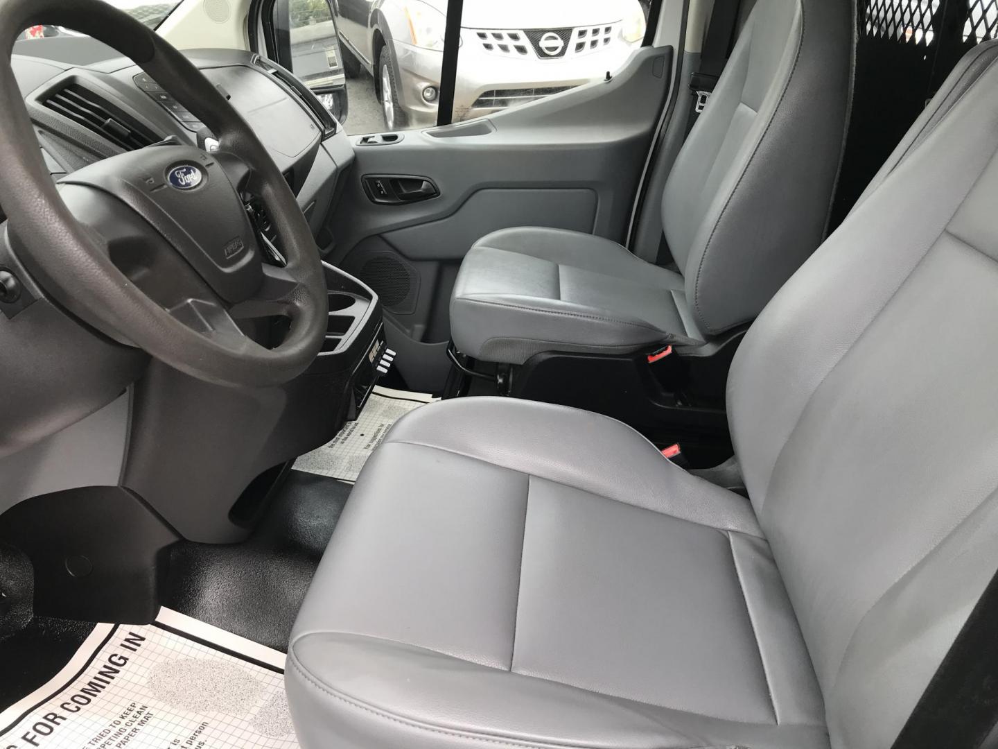 2015 White /Gray Ford Transit 150 Van Low Roof w/Sliding Pass. 130-in. WB (1FTNE1YM7FK) with an 3.7L V6 DOHC 24V engine, 6-Speed Automatic transmission, located at 577 Chester Pike, Prospect Park, PA, 19076, (610) 237-1015, 39.886154, -75.302338 - 2015 Ford Transit 150 Low Roof: Only 135k miles, ladder racks, multiple pieces of shelving, partition, new PA inspection, FLEET MAINTAINED, runs LIKE NEW! This vehicle comes inspected and has been given a bumper to bumper safety check. It is very clean, reliable, and well maintained. We offer a u - Photo#9