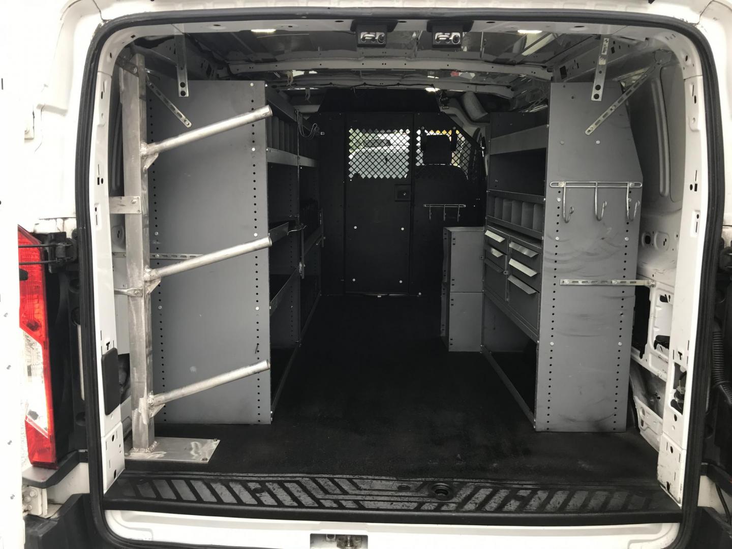 2015 White /Gray Ford Transit 150 Van Low Roof w/Sliding Pass. 130-in. WB (1FTNE1YM9FK) with an 3.7L V6 DOHC 24V engine, 6-Speed Automatic transmission, located at 577 Chester Pike, Prospect Park, PA, 19076, (610) 237-1015, 39.886154, -75.302338 - 2015 Ford Transit 150 Low Roof: Only 129k miles, ladder racks, shelving, partition, new PA inspection, FLEET MAINTAINED, runs LIKE NEW! This vehicle comes inspected and has been given a bumper to bumper safety check. It is very clean, reliable, and well maintained. We offer a unique pay plan that - Photo#17