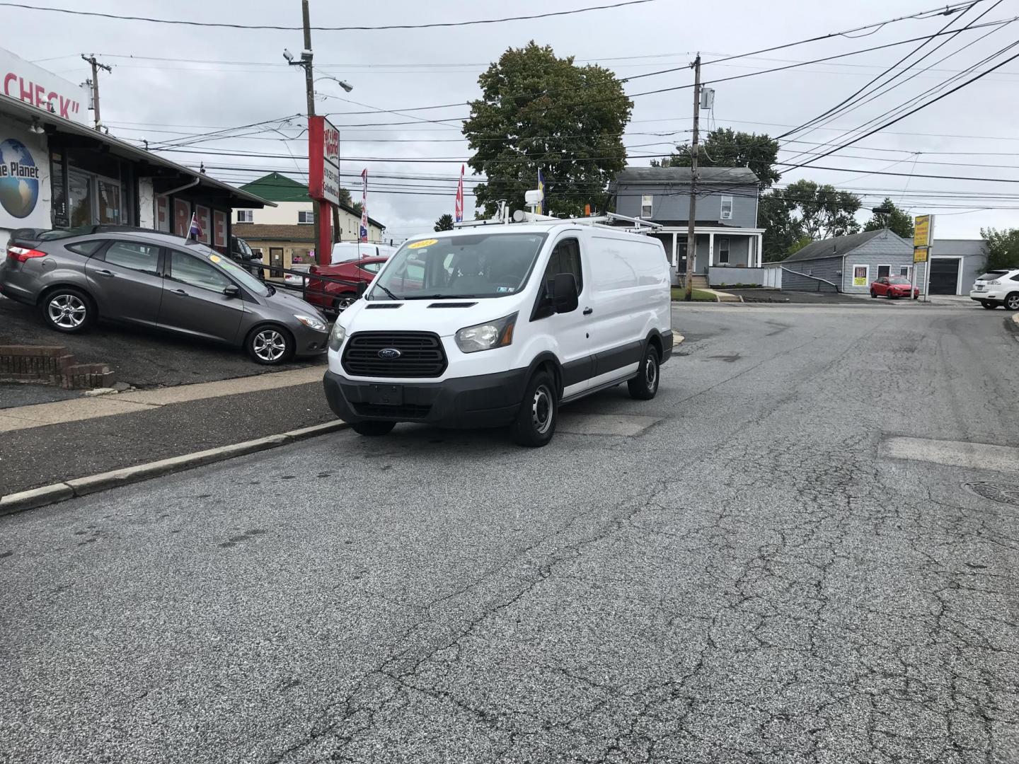 2015 White /Gray Ford Transit 150 Van Low Roof w/Sliding Pass. 130-in. WB (1FTNE1YM9FK) with an 3.7L V6 DOHC 24V engine, 6-Speed Automatic transmission, located at 577 Chester Pike, Prospect Park, PA, 19076, (610) 237-1015, 39.886154, -75.302338 - 2015 Ford Transit 150 Low Roof: Only 129k miles, ladder racks, shelving, partition, new PA inspection, FLEET MAINTAINED, runs LIKE NEW! This vehicle comes inspected and has been given a bumper to bumper safety check. It is very clean, reliable, and well maintained. We offer a unique pay plan that - Photo#2