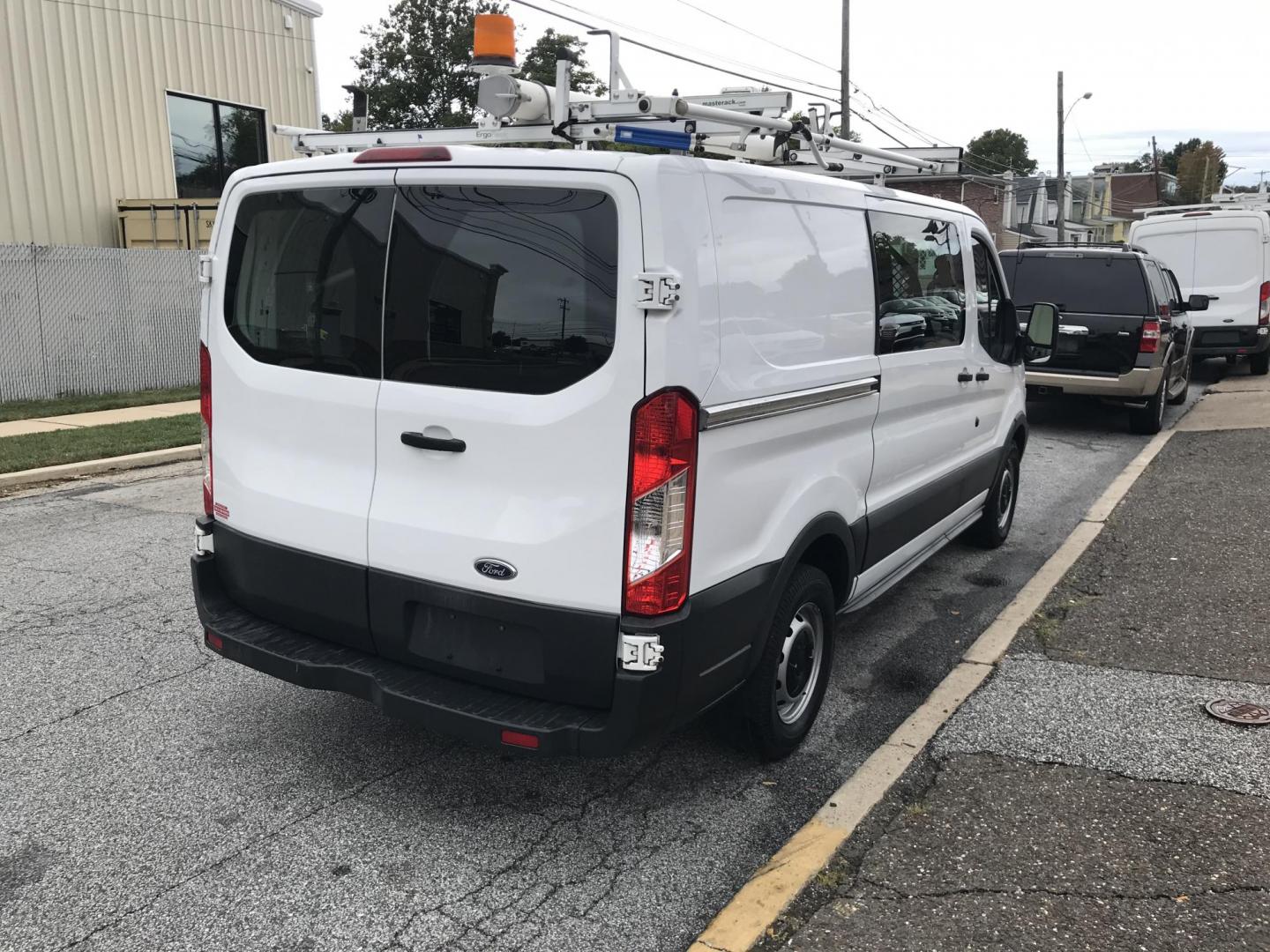 2015 White /Gray Ford Transit 150 Van Low Roof w/Sliding Pass. 130-in. WB (1FTNE1YM9FK) with an 3.7L V6 DOHC 24V engine, 6-Speed Automatic transmission, located at 577 Chester Pike, Prospect Park, PA, 19076, (610) 237-1015, 39.886154, -75.302338 - 2015 Ford Transit 150 Low Roof: Only 129k miles, ladder racks, shelving, partition, new PA inspection, FLEET MAINTAINED, runs LIKE NEW! This vehicle comes inspected and has been given a bumper to bumper safety check. It is very clean, reliable, and well maintained. We offer a unique pay plan that - Photo#5