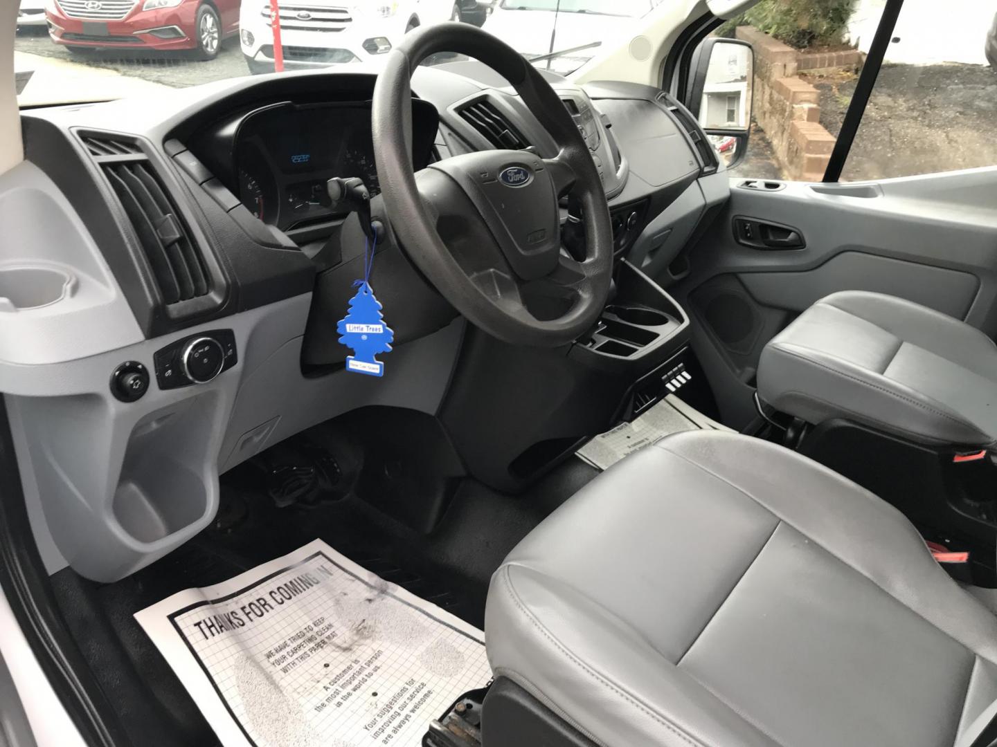 2015 White /Gray Ford Transit 150 Van Low Roof w/Sliding Pass. 130-in. WB (1FTNE1YM9FK) with an 3.7L V6 DOHC 24V engine, 6-Speed Automatic transmission, located at 577 Chester Pike, Prospect Park, PA, 19076, (610) 237-1015, 39.886154, -75.302338 - 2015 Ford Transit 150 Low Roof: Only 129k miles, ladder racks, shelving, partition, new PA inspection, FLEET MAINTAINED, runs LIKE NEW! This vehicle comes inspected and has been given a bumper to bumper safety check. It is very clean, reliable, and well maintained. We offer a unique pay plan that - Photo#8