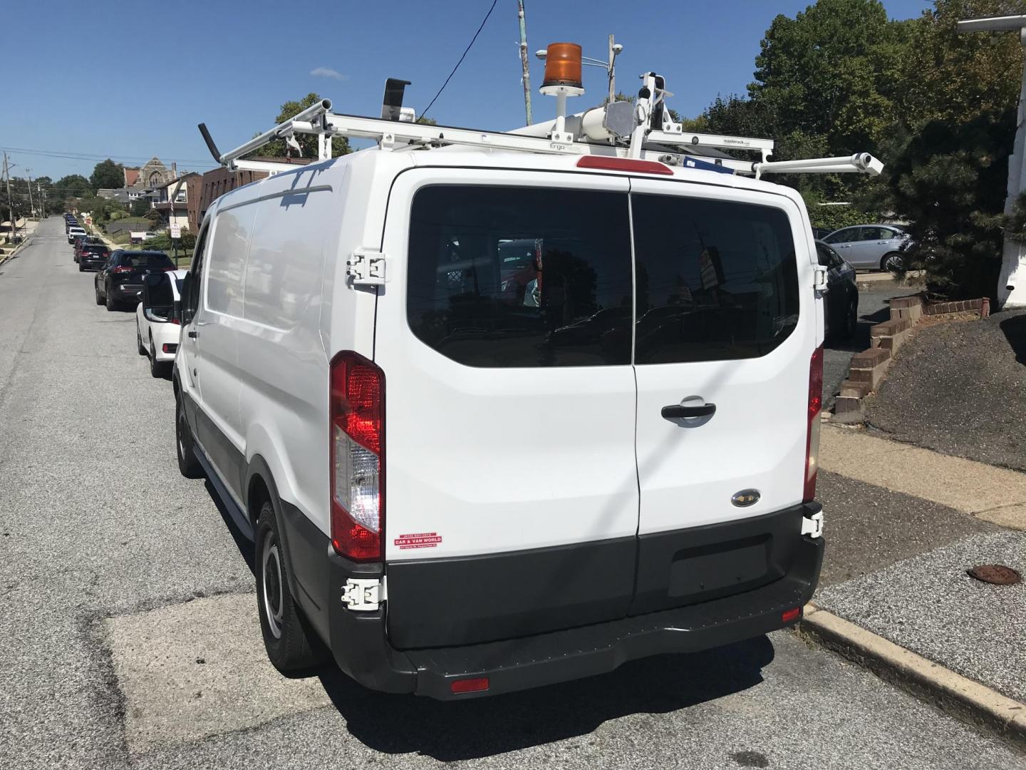 2015 White /Gray Ford Transit 150 Van Low Roof w/Sliding Pass. 130-in. WB (1FTNE1YM7FK) with an 3.7L V6 DOHC 24V engine, 6-Speed Automatic transmission, located at 577 Chester Pike, Prospect Park, PA, 19076, (610) 237-1015, 39.886154, -75.302338 - 2015 Ford Transit 150 Low Roof: Only 134k miles, drop down ladder racks, shelving, new PA inspection, partition, FLEET MAINTAINED! This vehicle comes inspected and has been given a bumper to bumper safety check. It is very clean, reliable, and well maintained. We offer a unique pay plan that is k - Photo#4