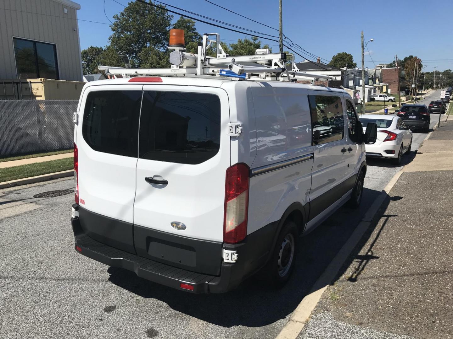 2015 White /Gray Ford Transit 150 Van Low Roof w/Sliding Pass. 130-in. WB (1FTNE1YM7FK) with an 3.7L V6 DOHC 24V engine, 6-Speed Automatic transmission, located at 577 Chester Pike, Prospect Park, PA, 19076, (610) 237-1015, 39.886154, -75.302338 - 2015 Ford Transit 150 Low Roof: Only 134k miles, drop down ladder racks, shelving, new PA inspection, partition, FLEET MAINTAINED! This vehicle comes inspected and has been given a bumper to bumper safety check. It is very clean, reliable, and well maintained. We offer a unique pay plan that is k - Photo#5