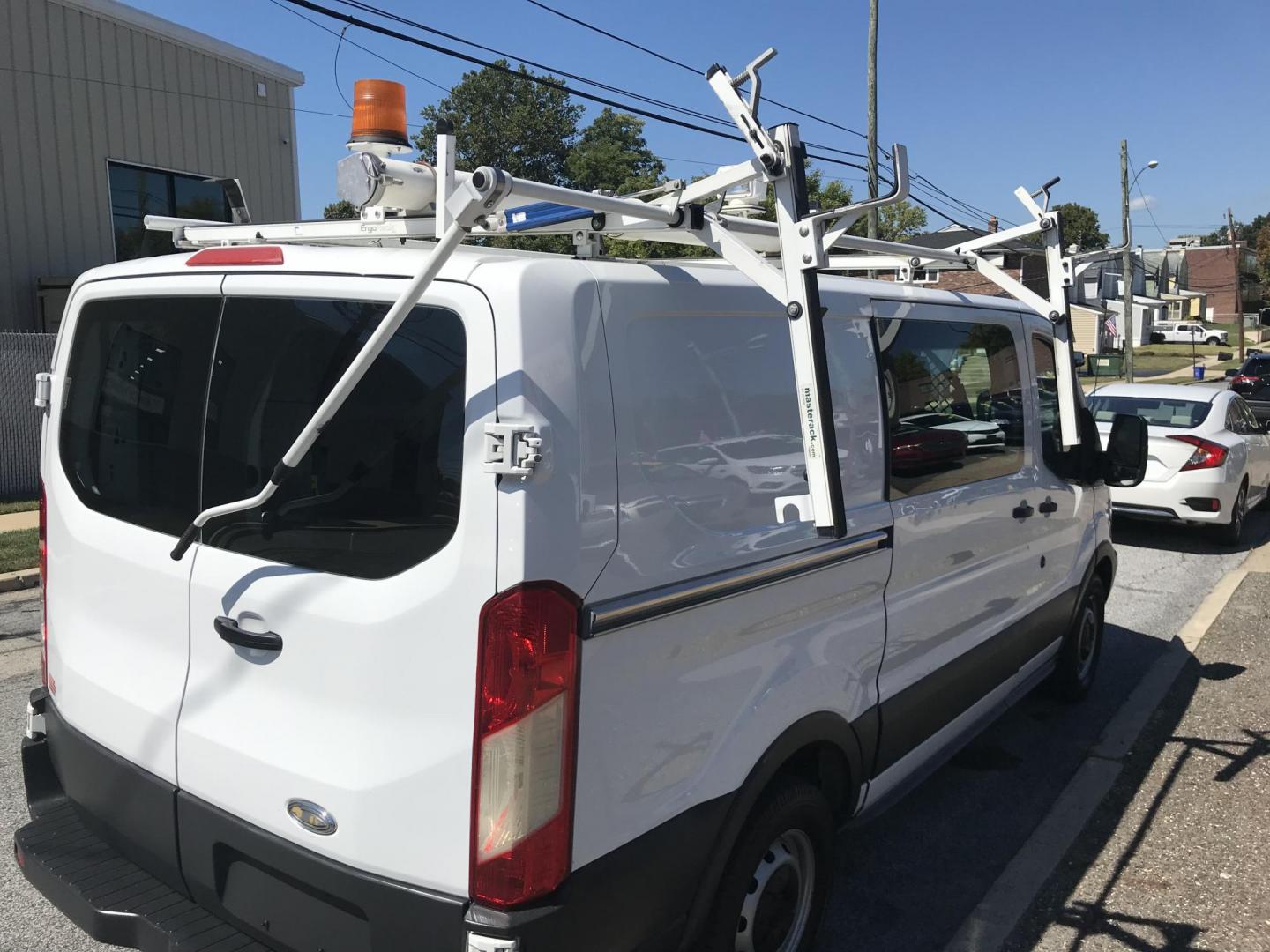 2015 White /Gray Ford Transit 150 Van Low Roof w/Sliding Pass. 130-in. WB (1FTNE1YM7FK) with an 3.7L V6 DOHC 24V engine, 6-Speed Automatic transmission, located at 577 Chester Pike, Prospect Park, PA, 19076, (610) 237-1015, 39.886154, -75.302338 - 2015 Ford Transit 150 Low Roof: Only 134k miles, drop down ladder racks, shelving, new PA inspection, partition, FLEET MAINTAINED! This vehicle comes inspected and has been given a bumper to bumper safety check. It is very clean, reliable, and well maintained. We offer a unique pay plan that is k - Photo#6