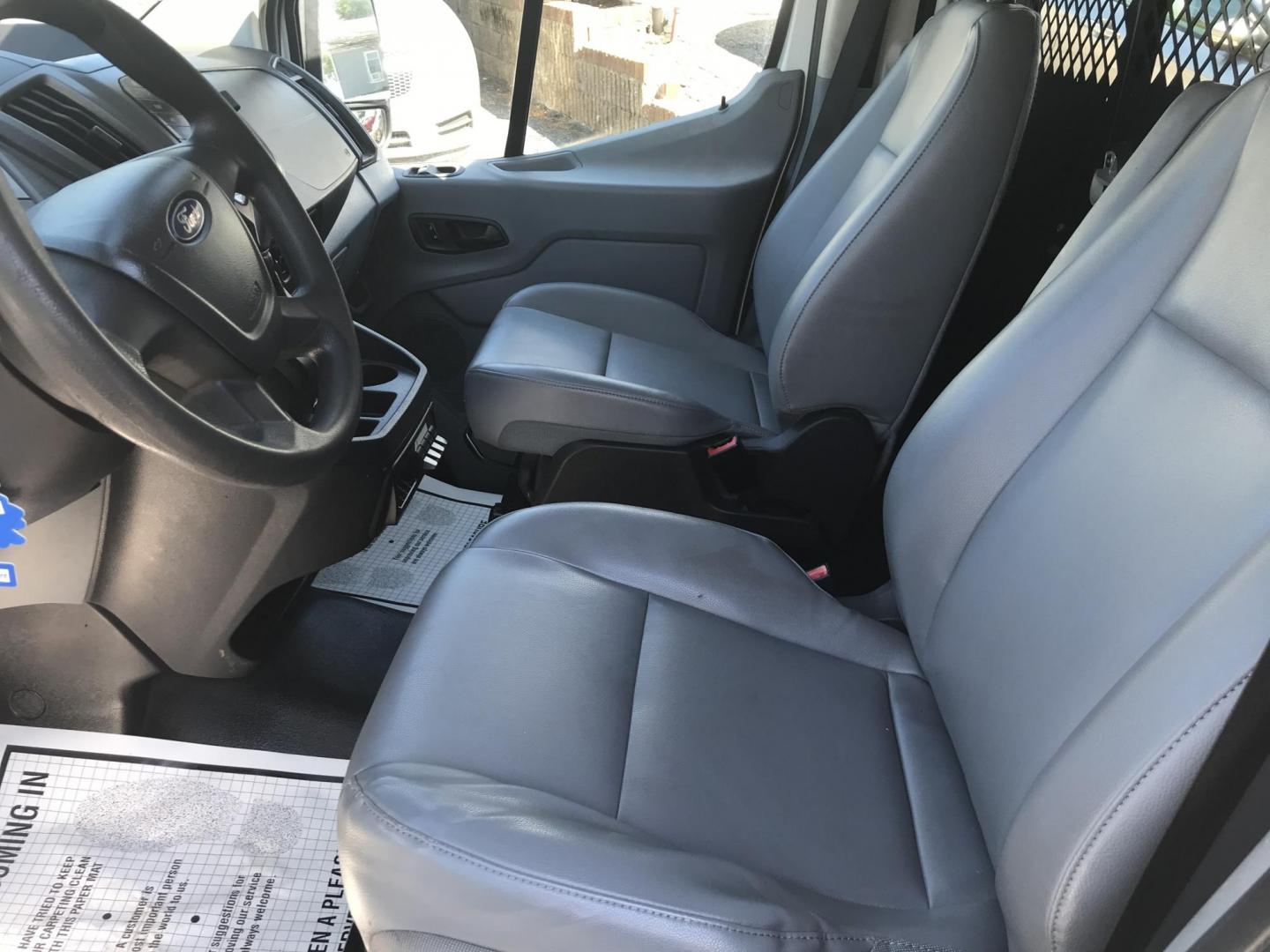 2015 White /Gray Ford Transit 150 Van Low Roof w/Sliding Pass. 130-in. WB (1FTNE1YM7FK) with an 3.7L V6 DOHC 24V engine, 6-Speed Automatic transmission, located at 577 Chester Pike, Prospect Park, PA, 19076, (610) 237-1015, 39.886154, -75.302338 - 2015 Ford Transit 150 Low Roof: Only 134k miles, drop down ladder racks, shelving, new PA inspection, partition, FLEET MAINTAINED! This vehicle comes inspected and has been given a bumper to bumper safety check. It is very clean, reliable, and well maintained. We offer a unique pay plan that is k - Photo#8