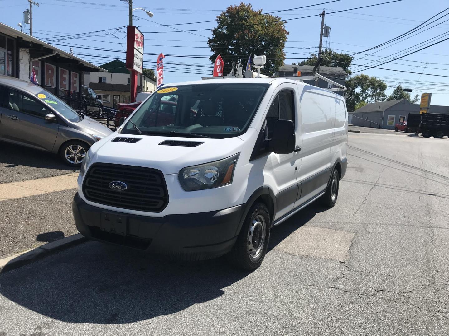 2015 White /Gray Ford Transit 150 Van Low Roof w/Sliding Pass. 130-in. WB (1FTNE1YM9FK) with an 3.7L V6 DOHC 24V engine, 6-Speed Automatic transmission, located at 577 Chester Pike, Prospect Park, PA, 19076, (610) 237-1015, 39.886154, -75.302338 - Photo#1