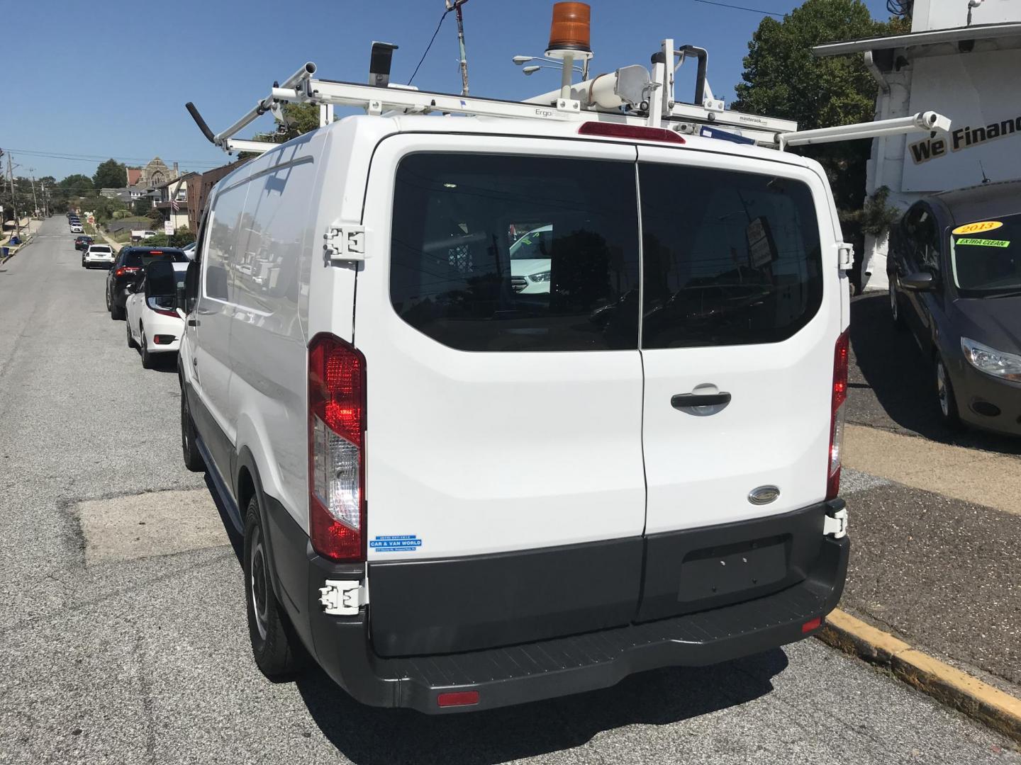 2015 White /Gray Ford Transit 150 Van Low Roof w/Sliding Pass. 130-in. WB (1FTNE1YM9FK) with an 3.7L V6 DOHC 24V engine, 6-Speed Automatic transmission, located at 577 Chester Pike, Prospect Park, PA, 19076, (610) 237-1015, 39.886154, -75.302338 - Photo#4