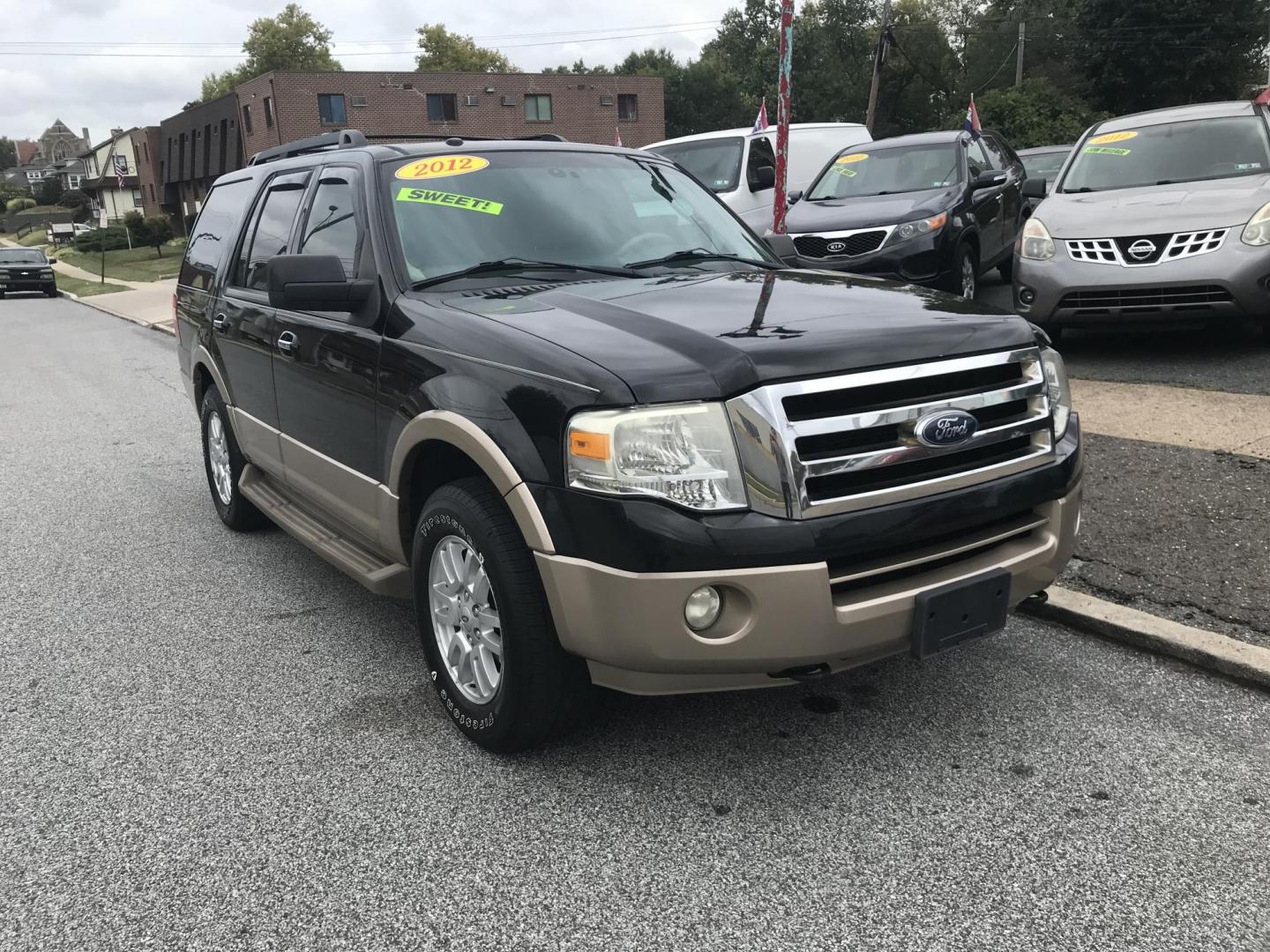 2012 Black /Tan Ford Expedition King Ranch 4WD (1FMJU1J56CE) with an 5.4L V8 SOHC 16V FFV engine, 6-Speed Automatic transmission, located at 577 Chester Pike, Prospect Park, PA, 19076, (610) 237-1015, 39.886154, -75.302338 - Photo#2